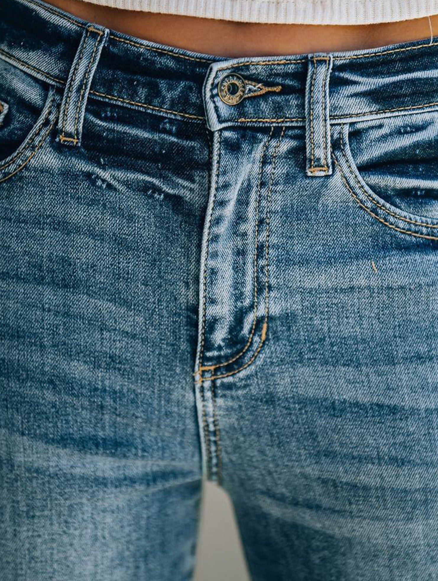 Raw-edge mid-rise slim-fit jeans