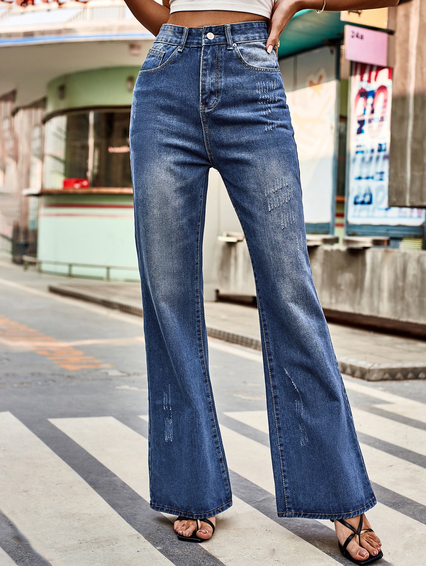 Mid-rise washed bootcut jeans