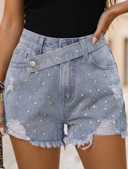 Women's washed distressed studded denim shorts