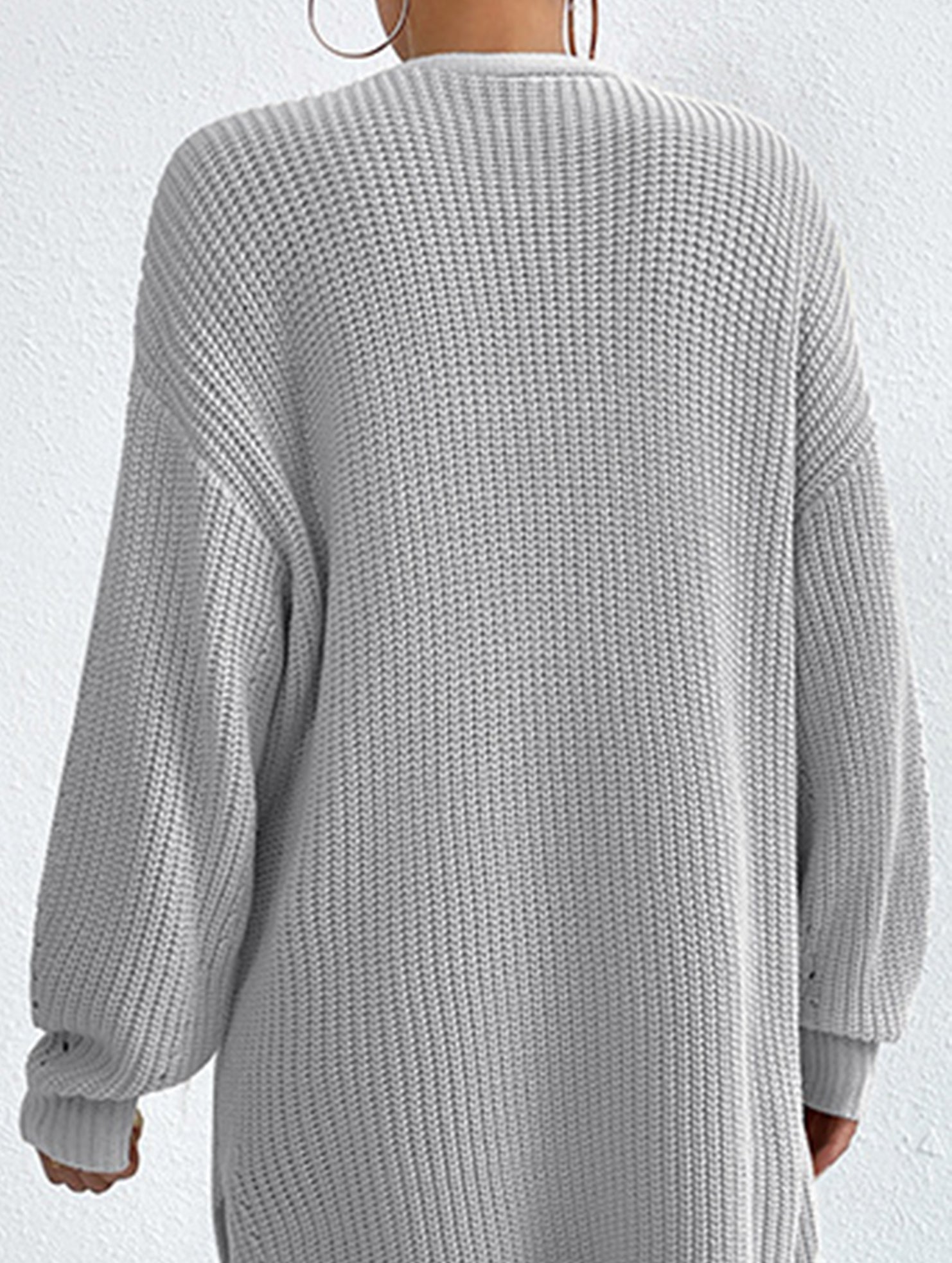 Loose mid-length V-neck solid color sweater