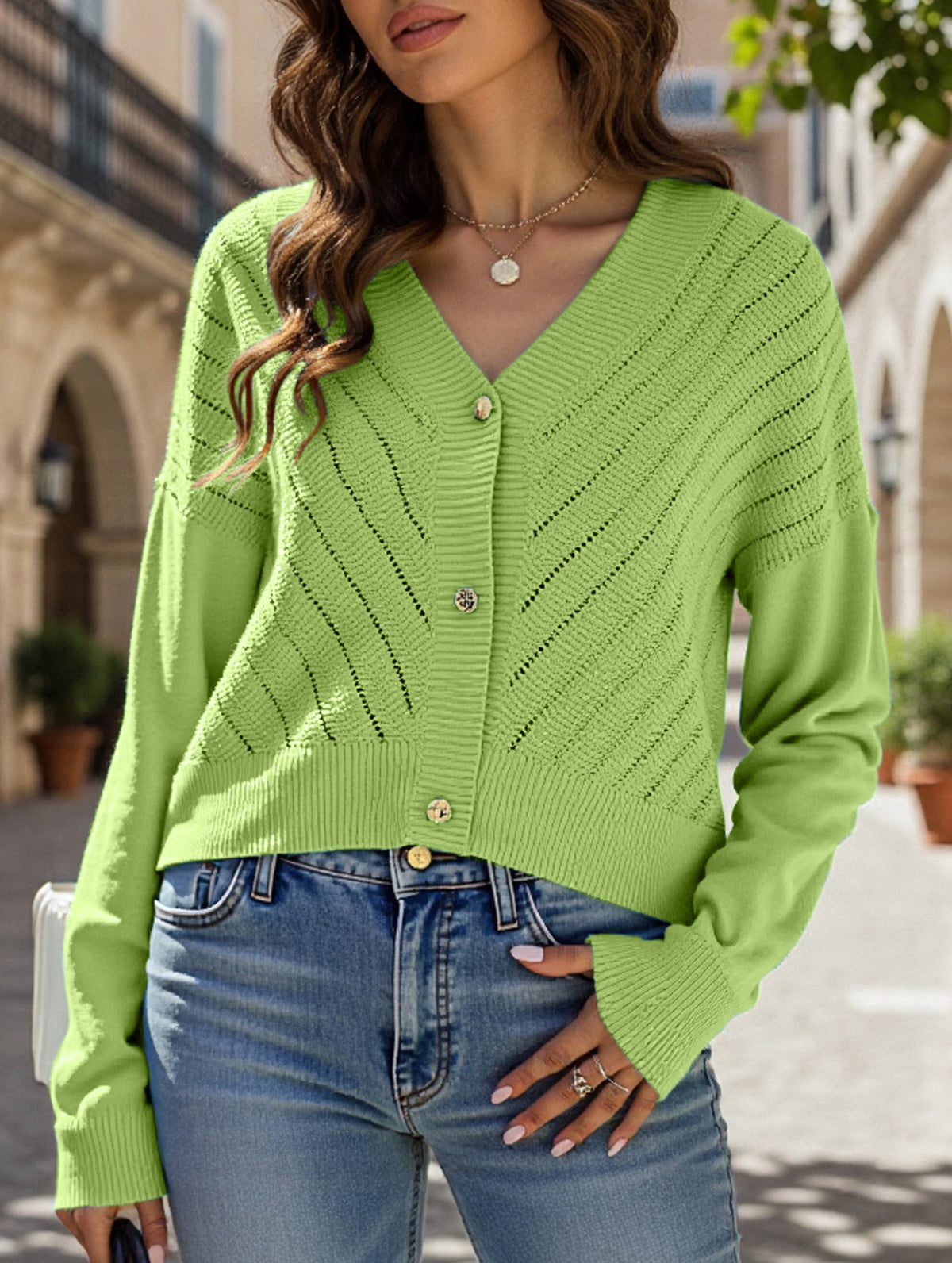 Loose long-sleeved V-neck hollow knit cardigan