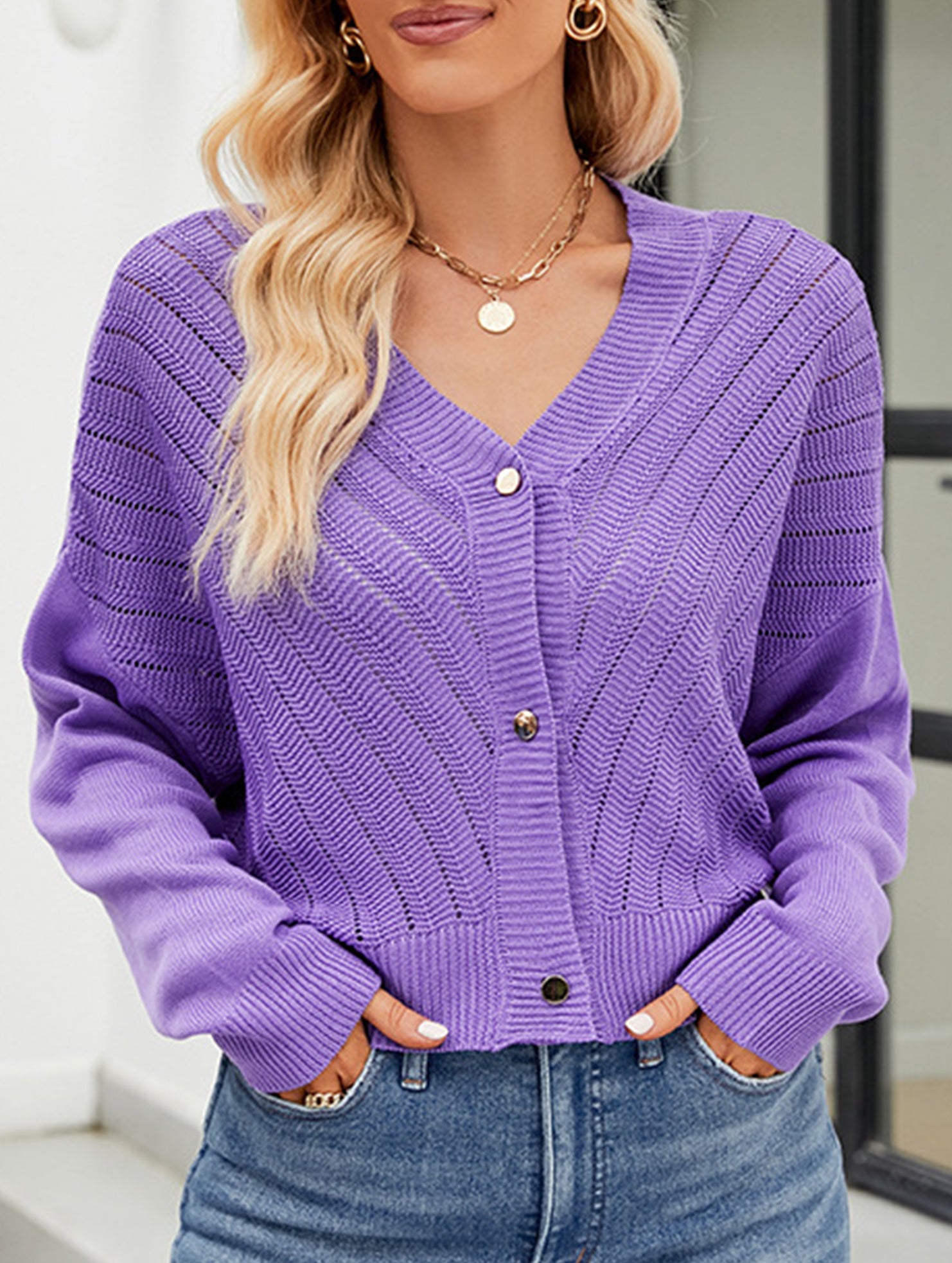 Loose long-sleeved V-neck hollow knit cardigan