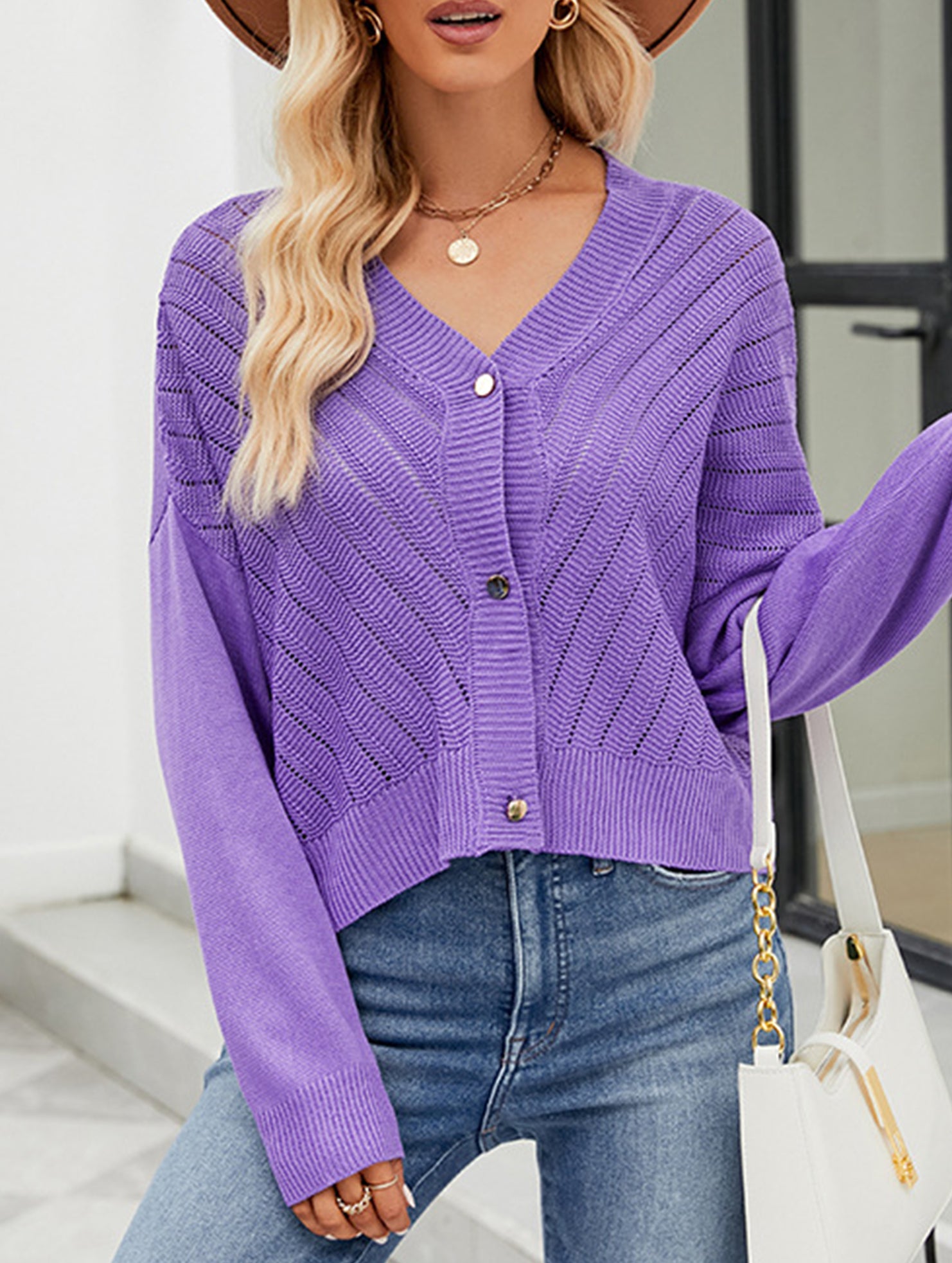 Loose long-sleeved V-neck hollow knit cardigan