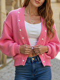 Women's pink button-down knit cardigan