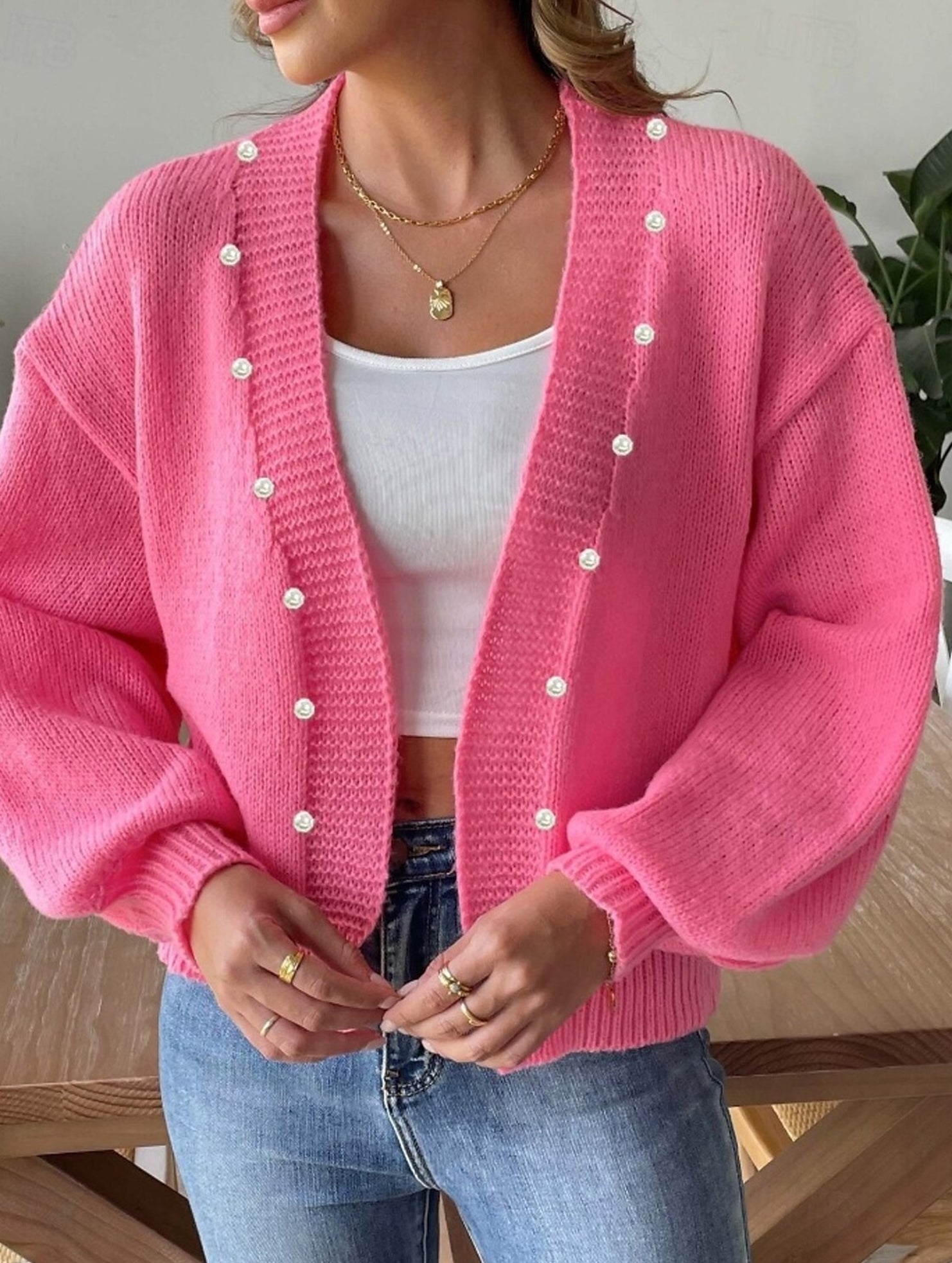 Women's pink button-down knit cardigan