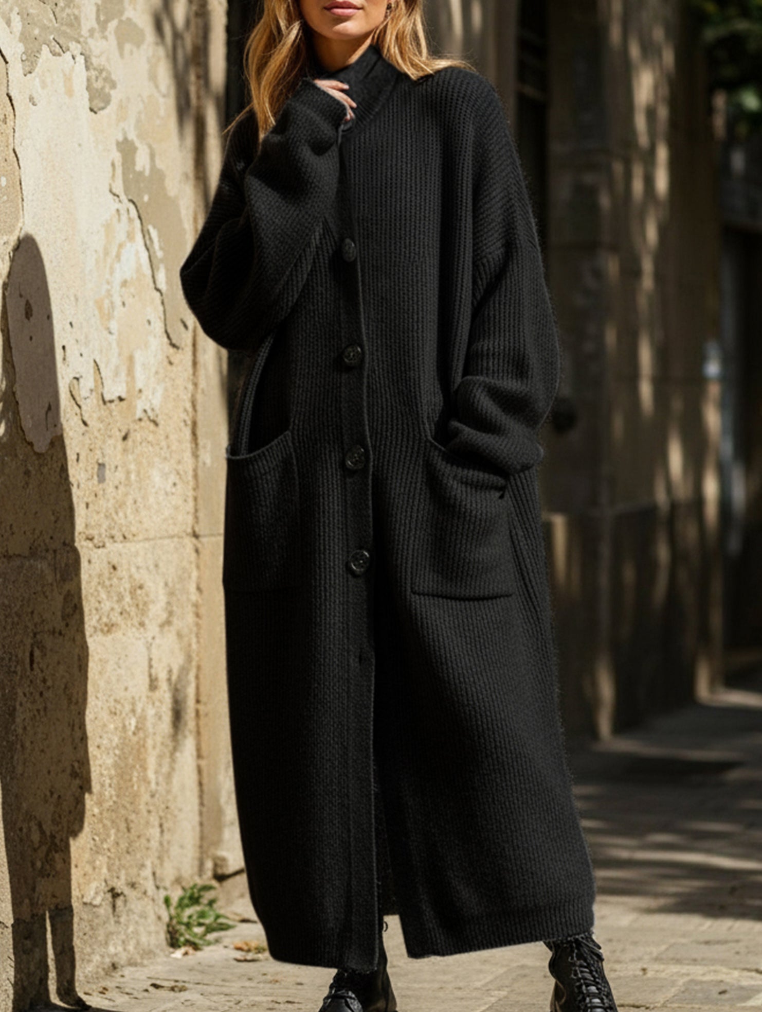 Oversized mid-length knitted cardigan