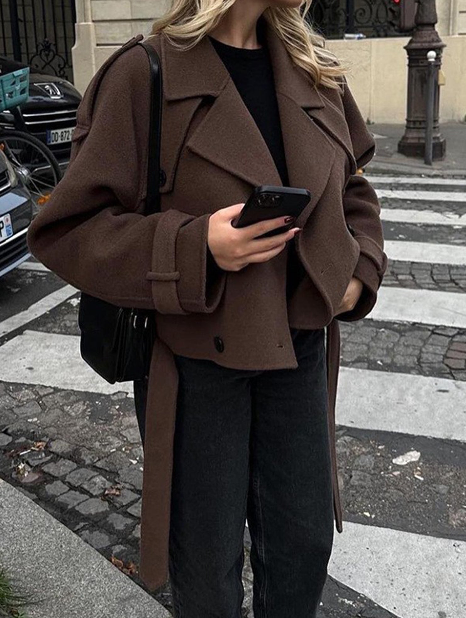 Stylish short belted coat with large lapel