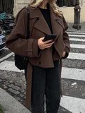 Stylish short belted coat with large lapel