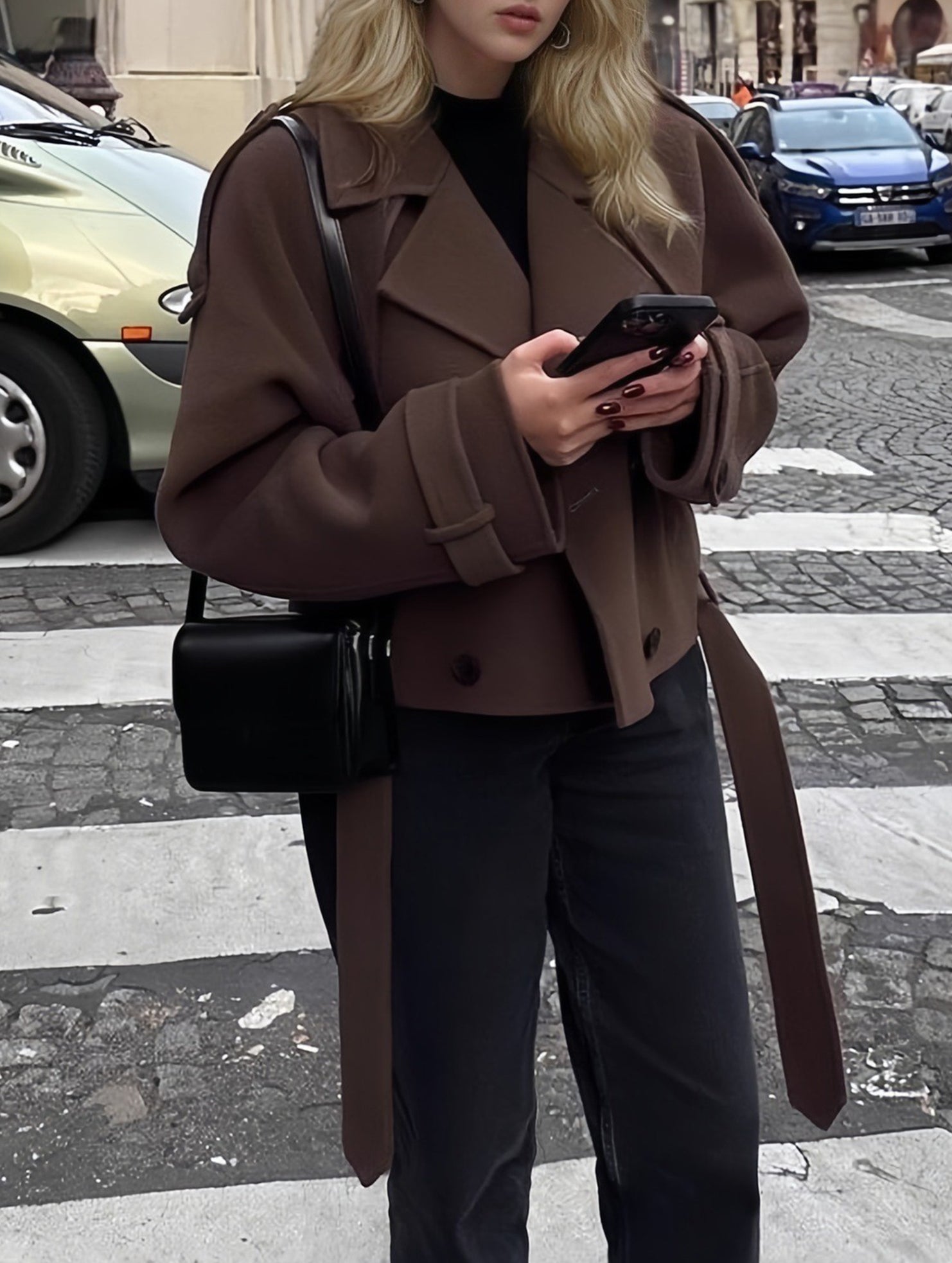 Stylish short belted coat with large lapel