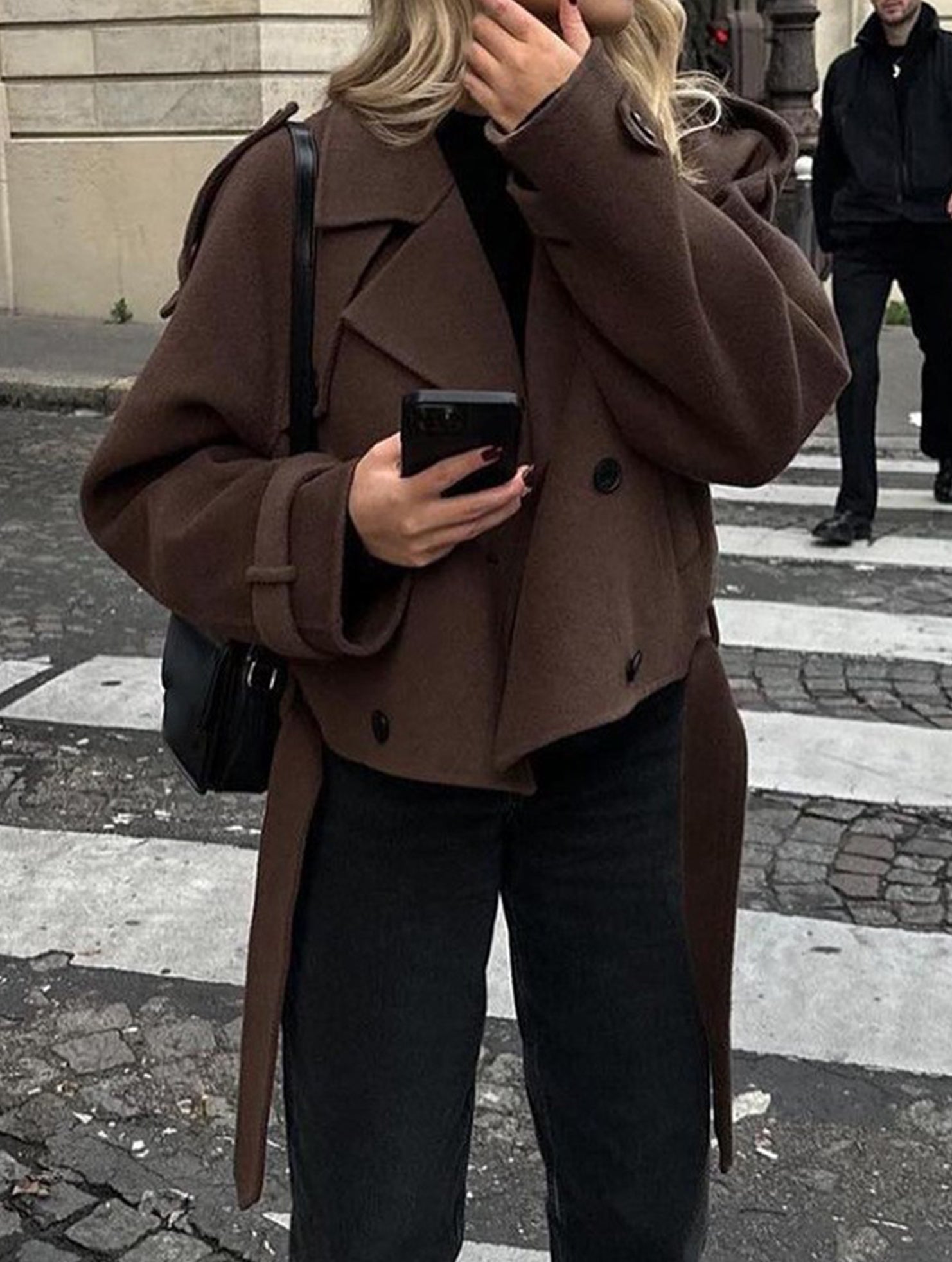 Stylish short belted coat with large lapel