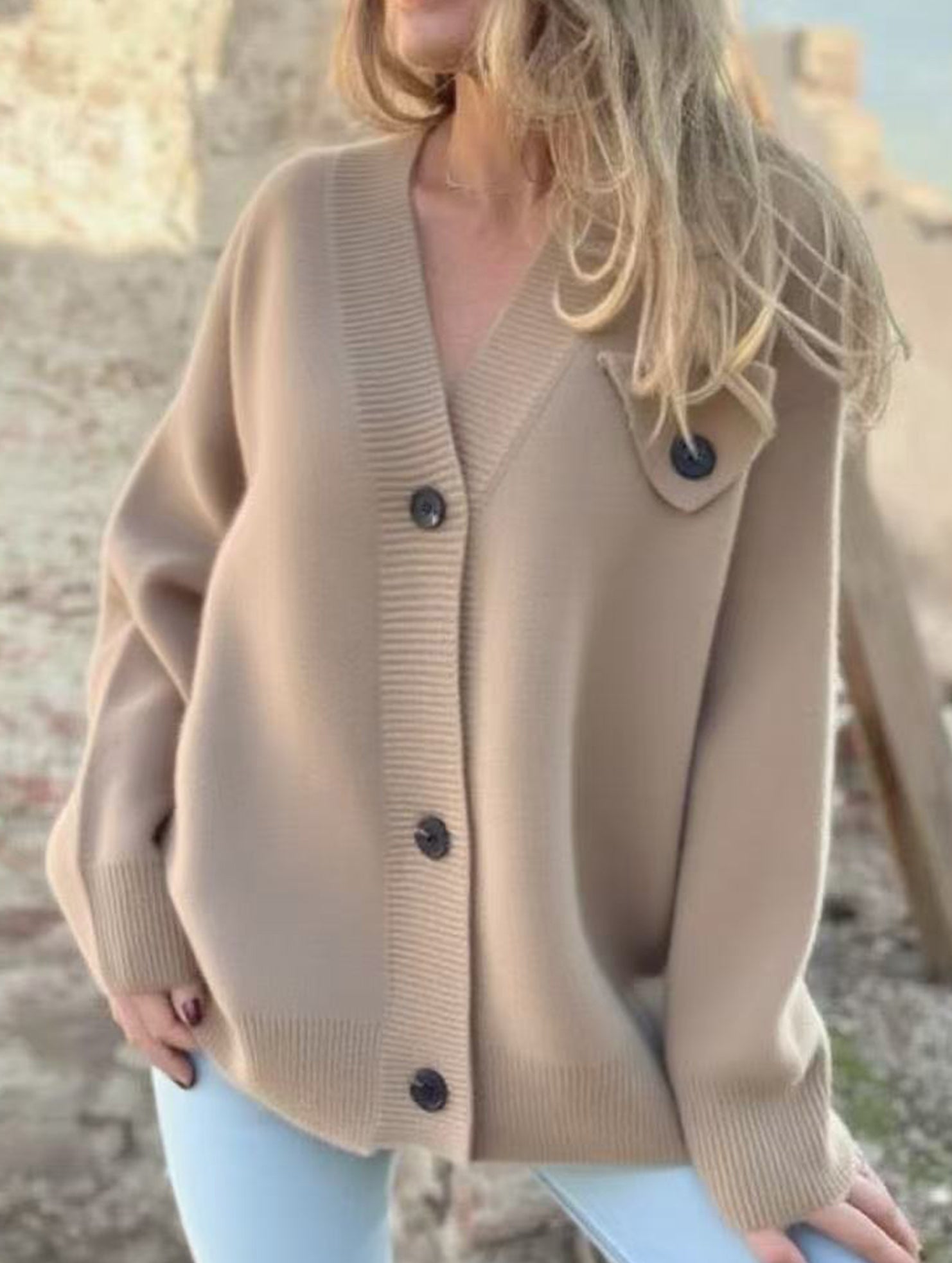 Long-sleeved triangular pocket knit cardigan