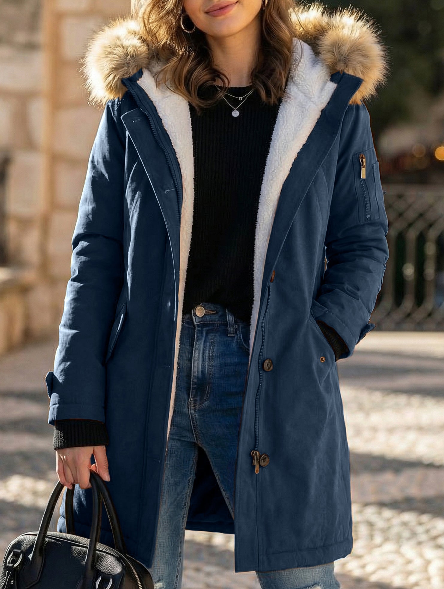 Long hooded women's coat with fur collar
