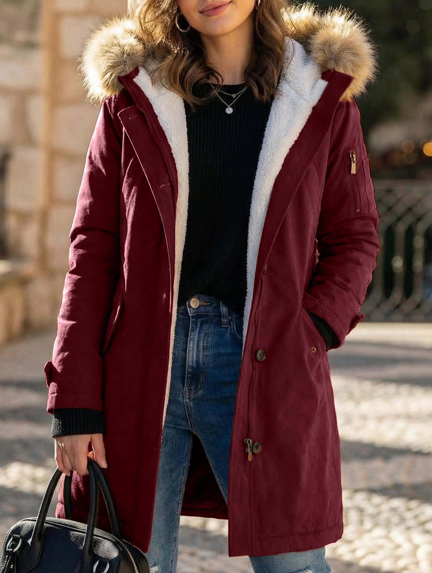Long hooded women's coat with fur collar