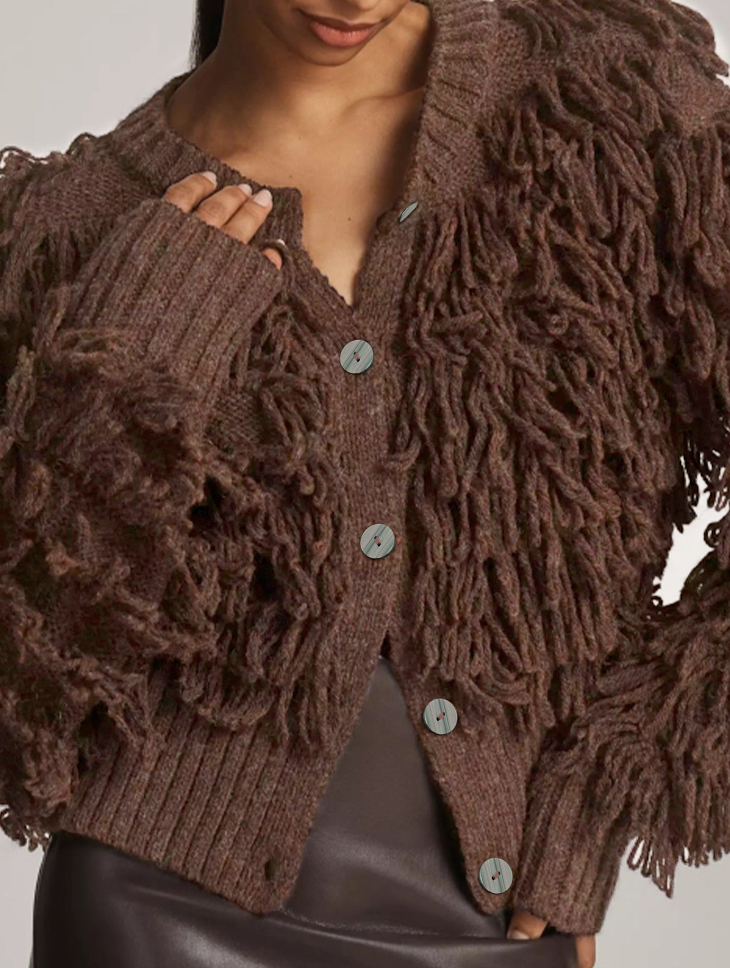 Button ring tassel sweater