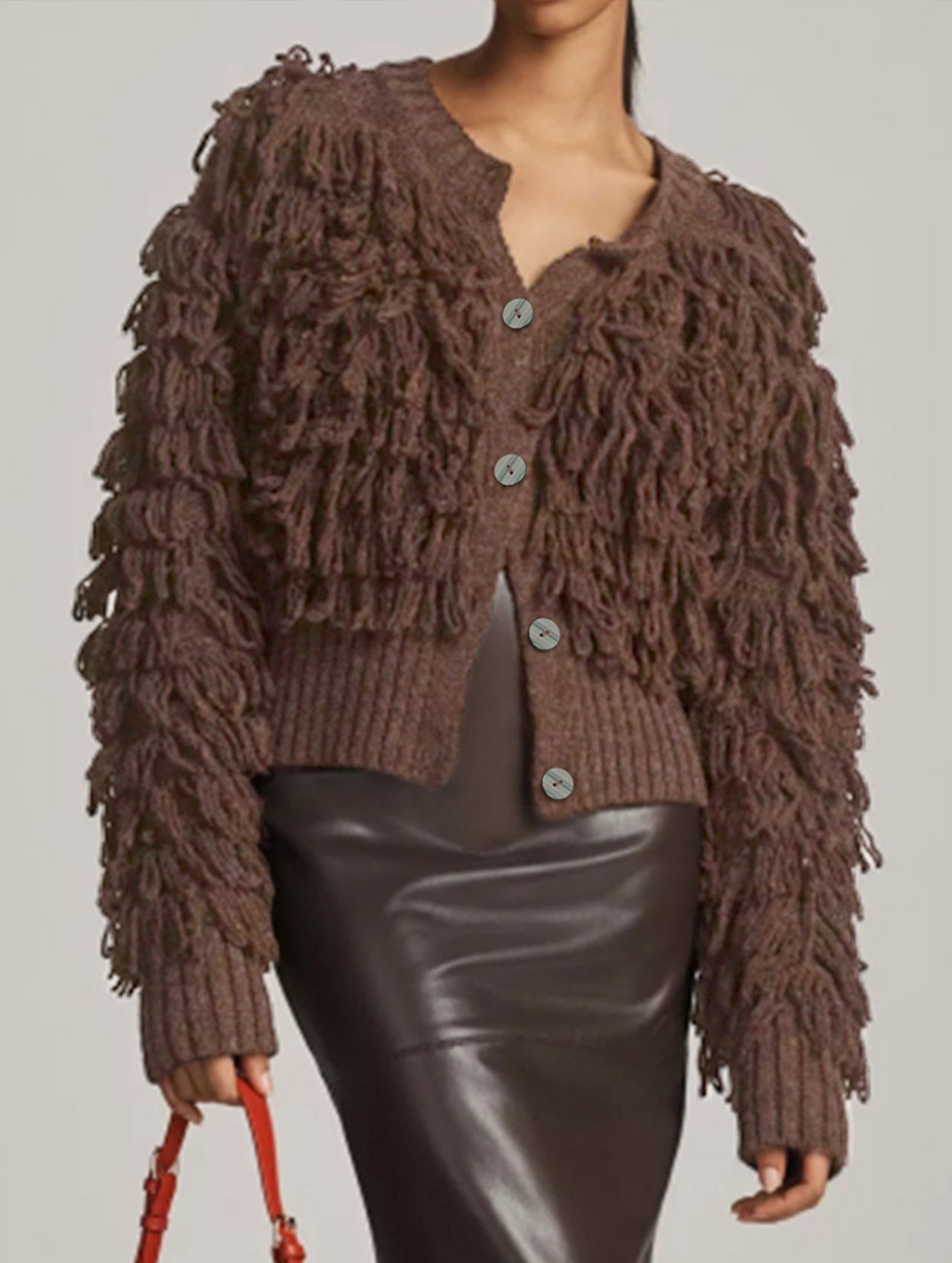 Button ring tassel sweater