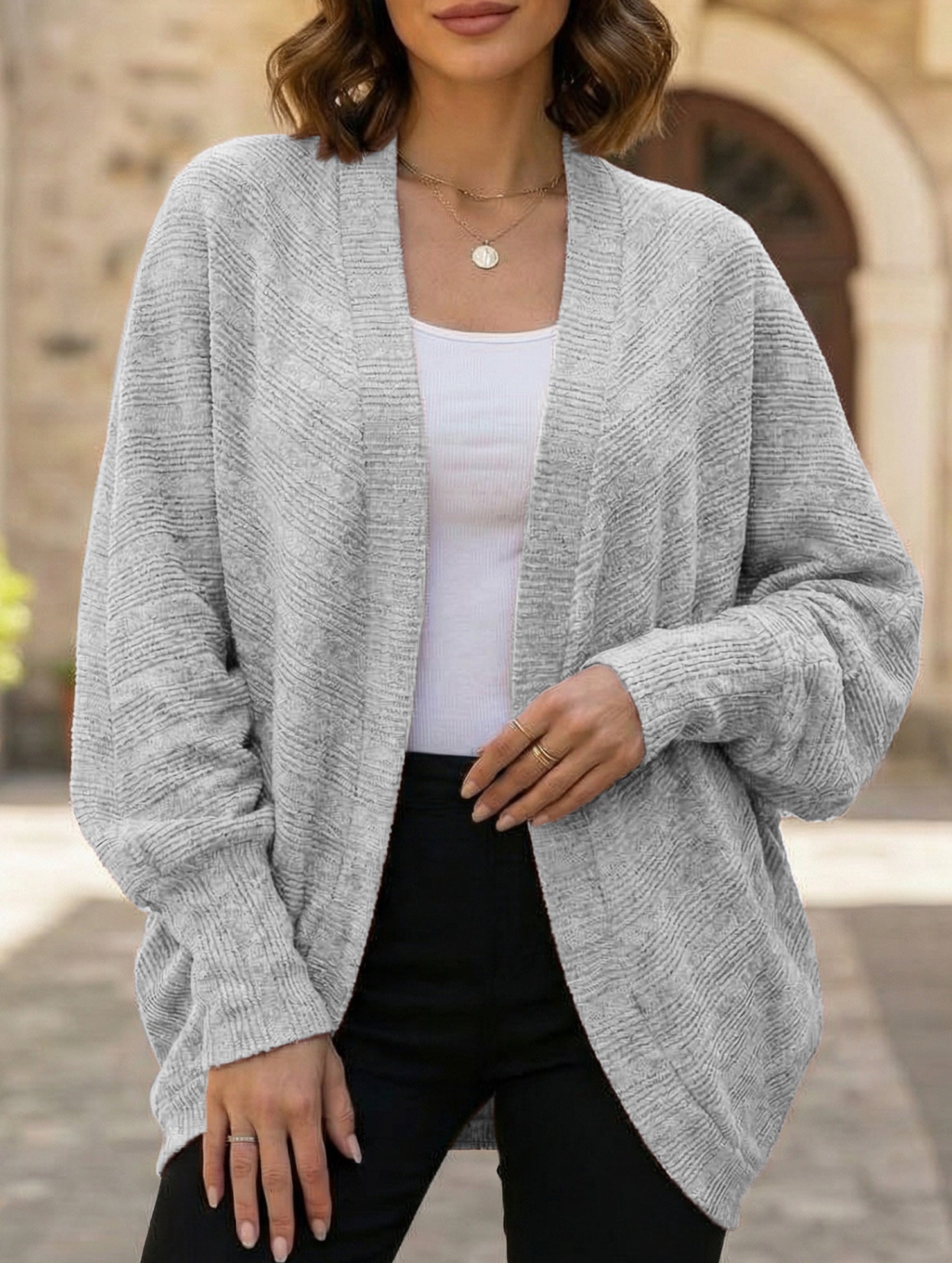 Solid color mid-length knitted cardigan