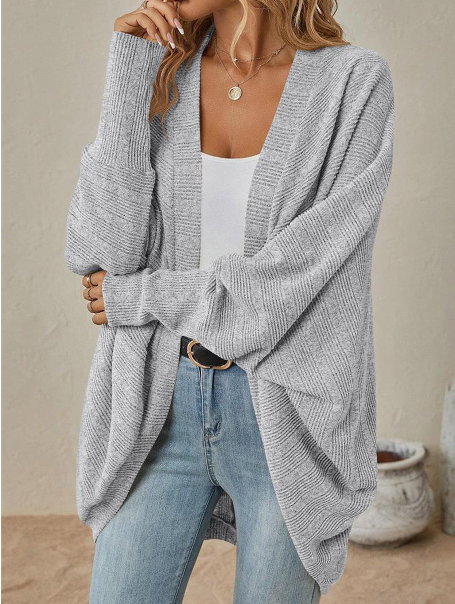 Solid color mid-length knitted cardigan