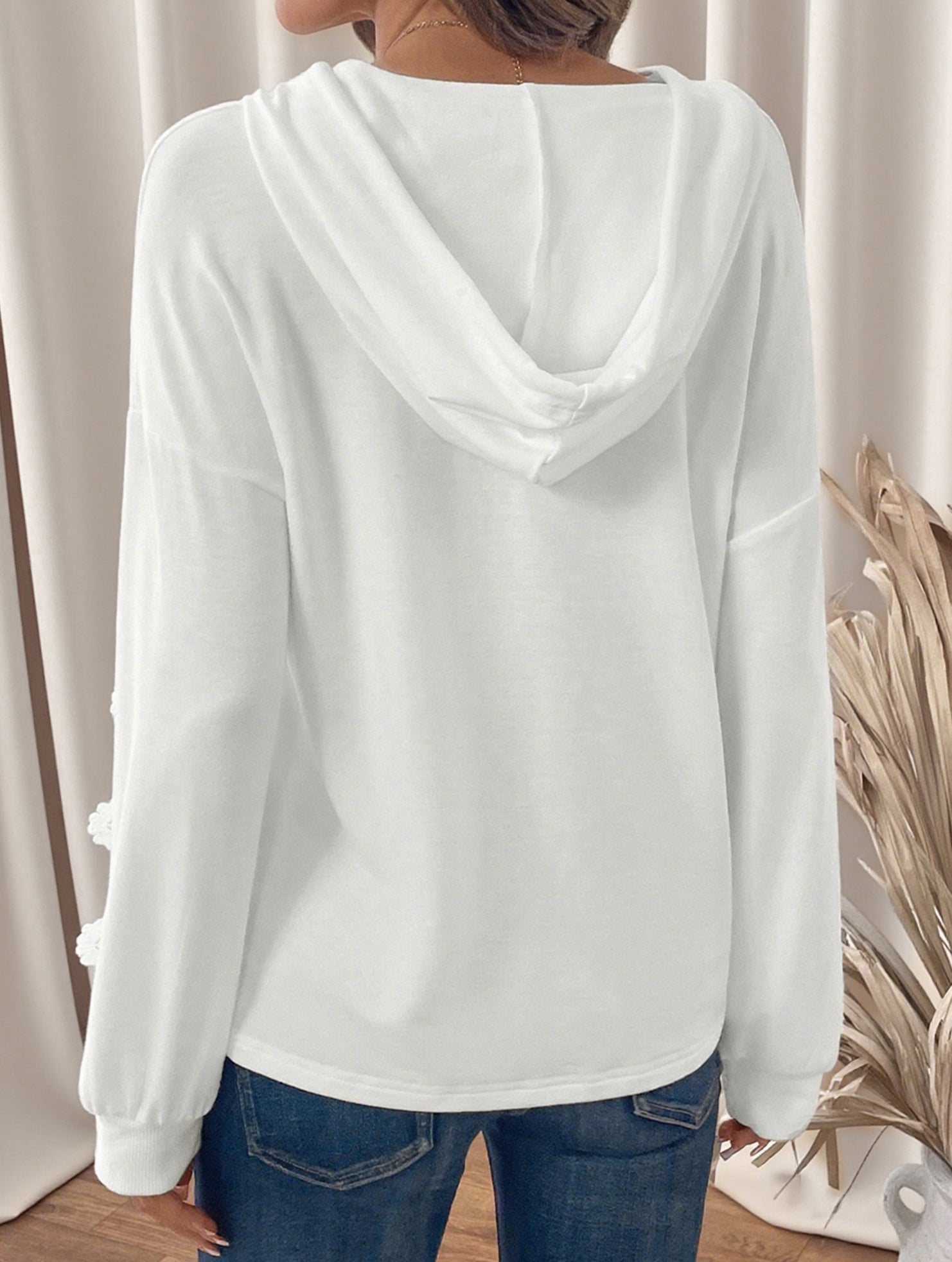 Solid color lace-paneled hooded sweatshirt