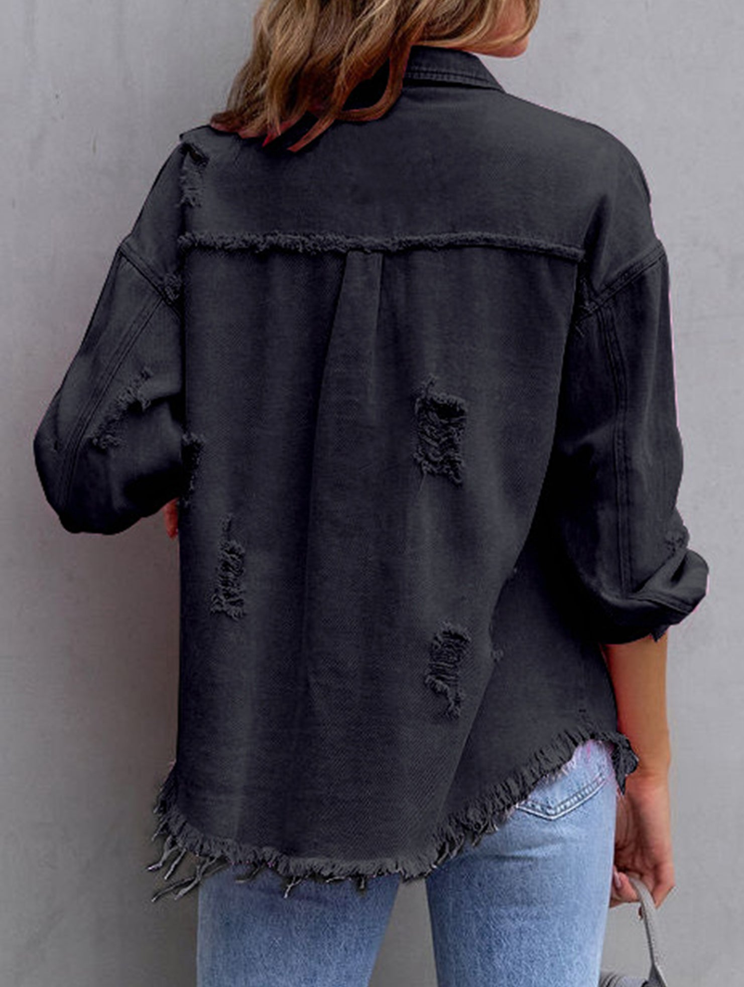 Old solid color denim coat with lapel and ripped raw edge