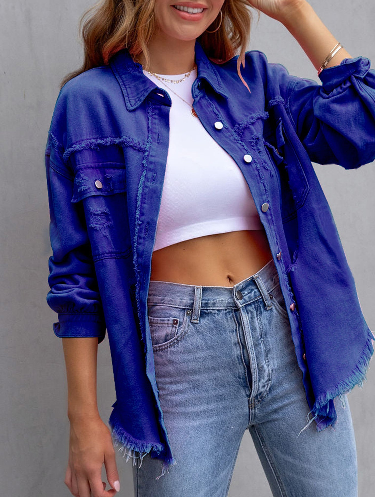 Old solid color denim coat with lapel and ripped raw edge