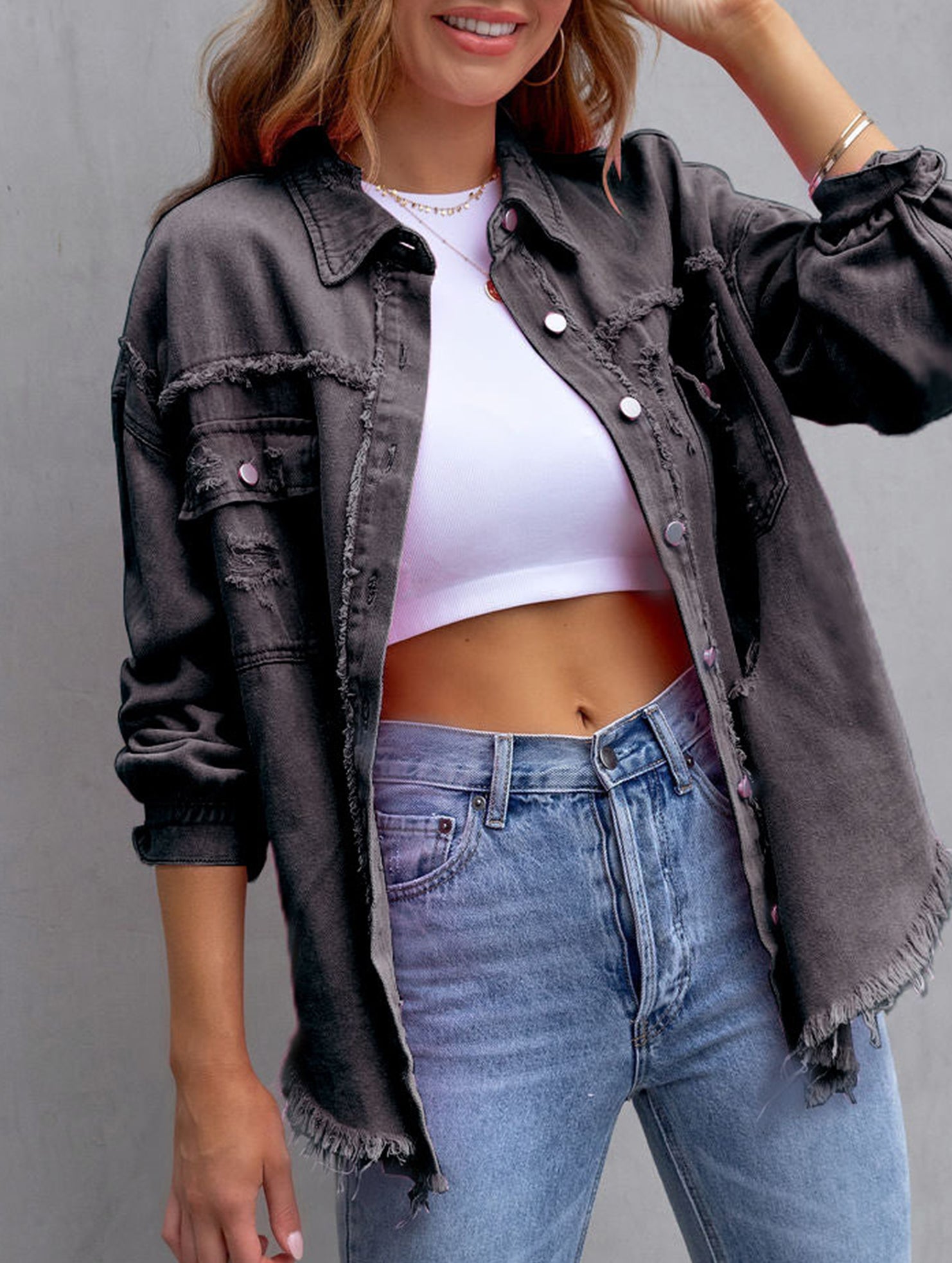 Old solid color denim coat with lapel and ripped raw edge