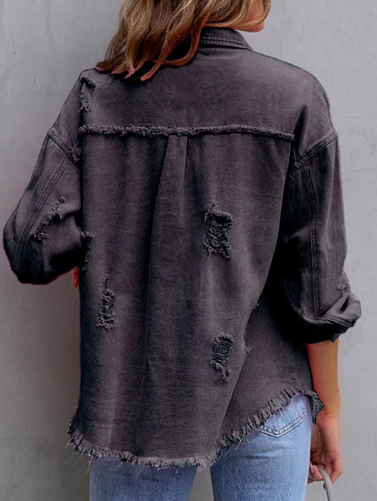 Old solid color denim coat with lapel and ripped raw edge