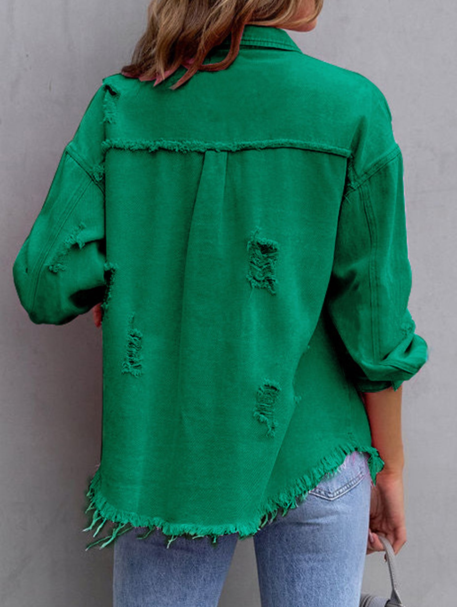 Old solid color denim coat with lapel and ripped raw edge