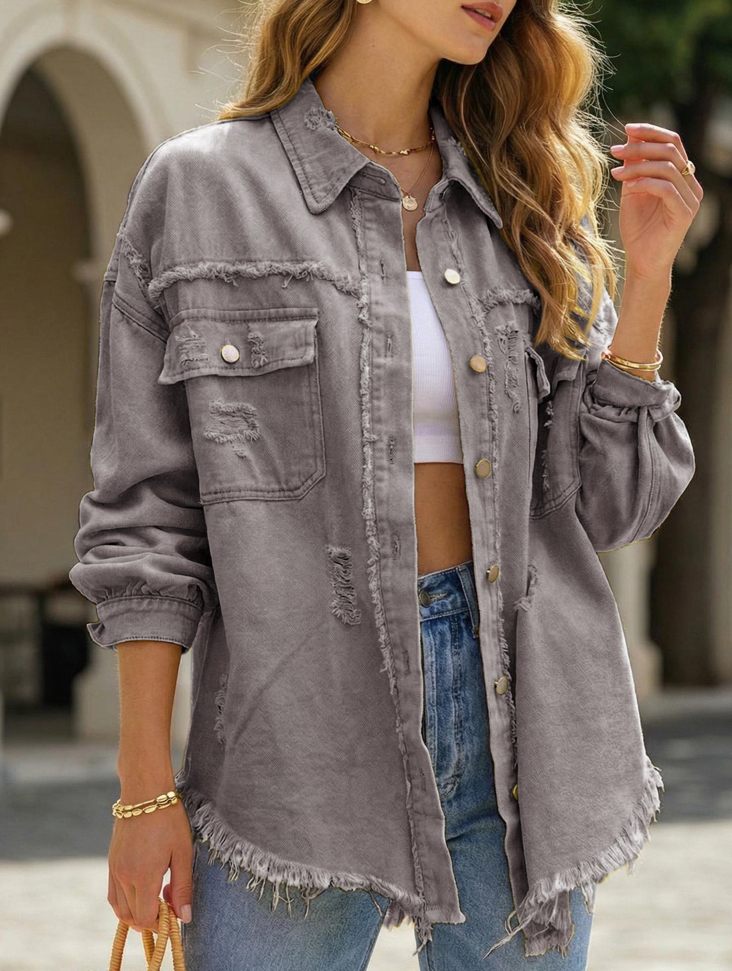 Old solid color denim coat with lapel and ripped raw edge