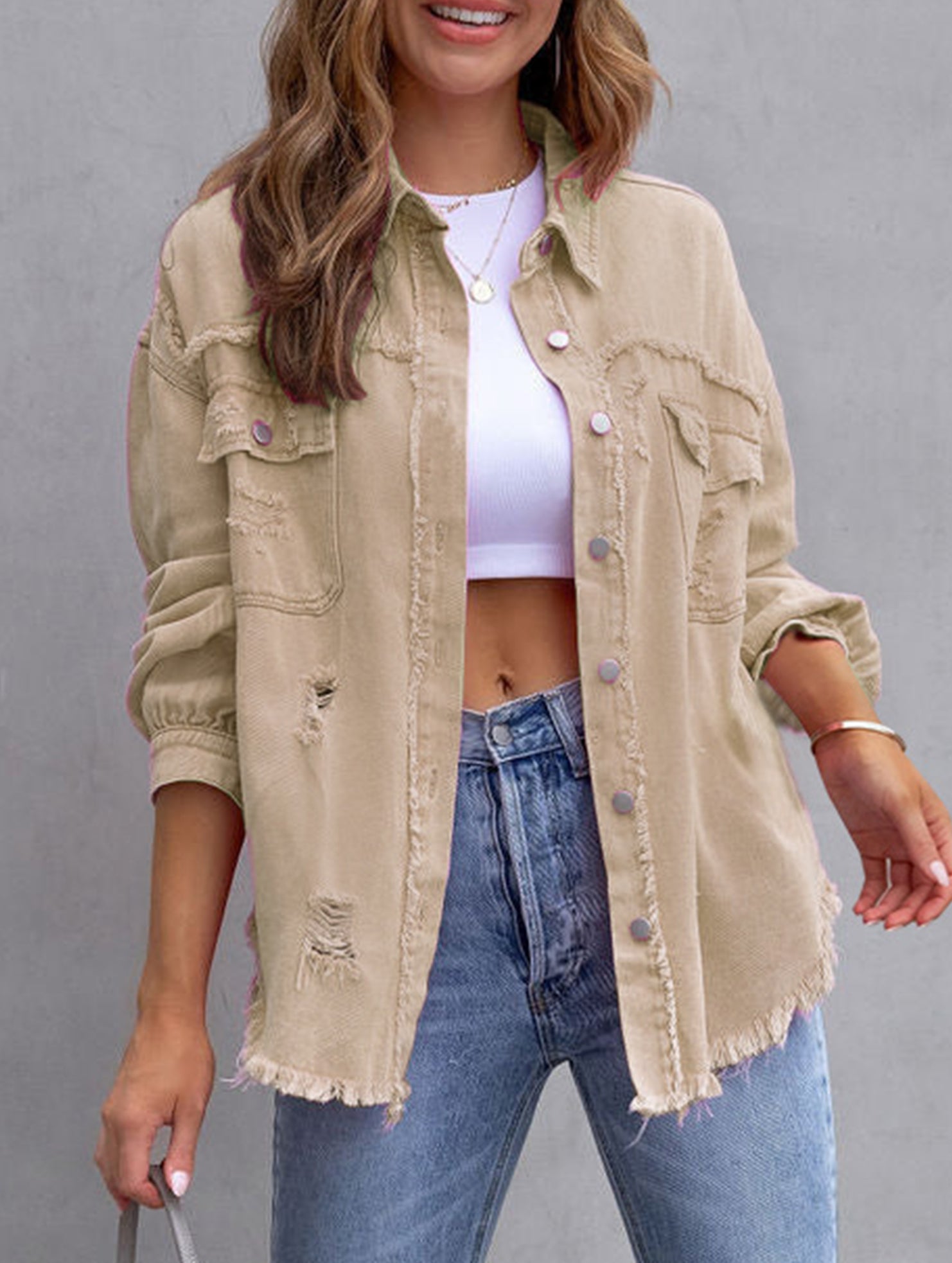 Old solid color denim coat with lapel and ripped raw edge