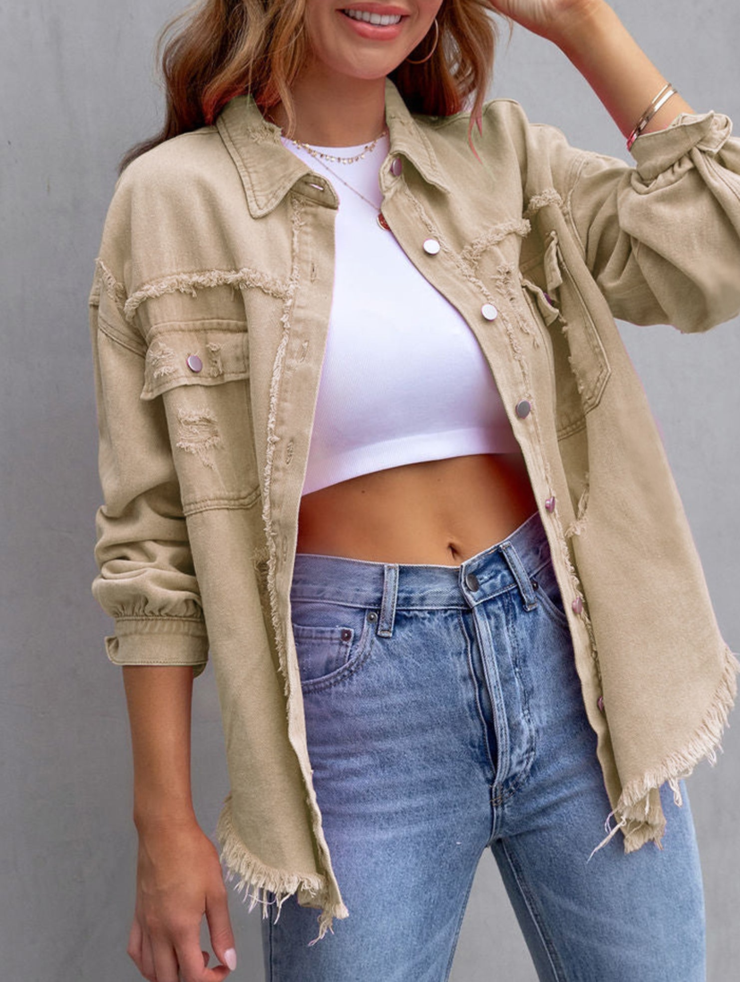 Old solid color denim coat with lapel and ripped raw edge