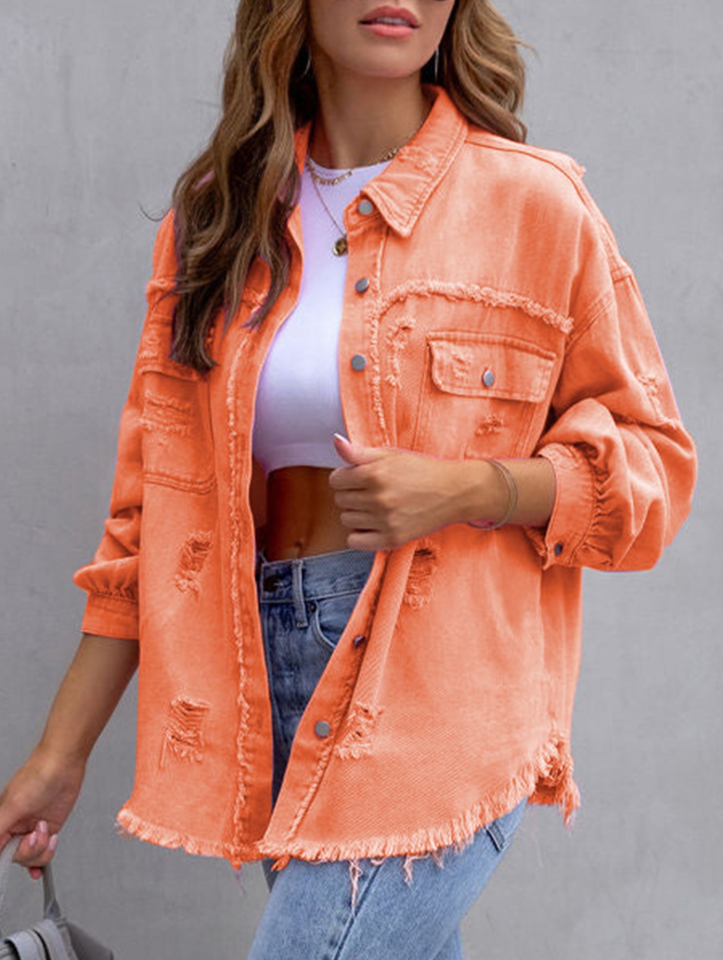 Old solid color denim coat with lapel and ripped raw edge