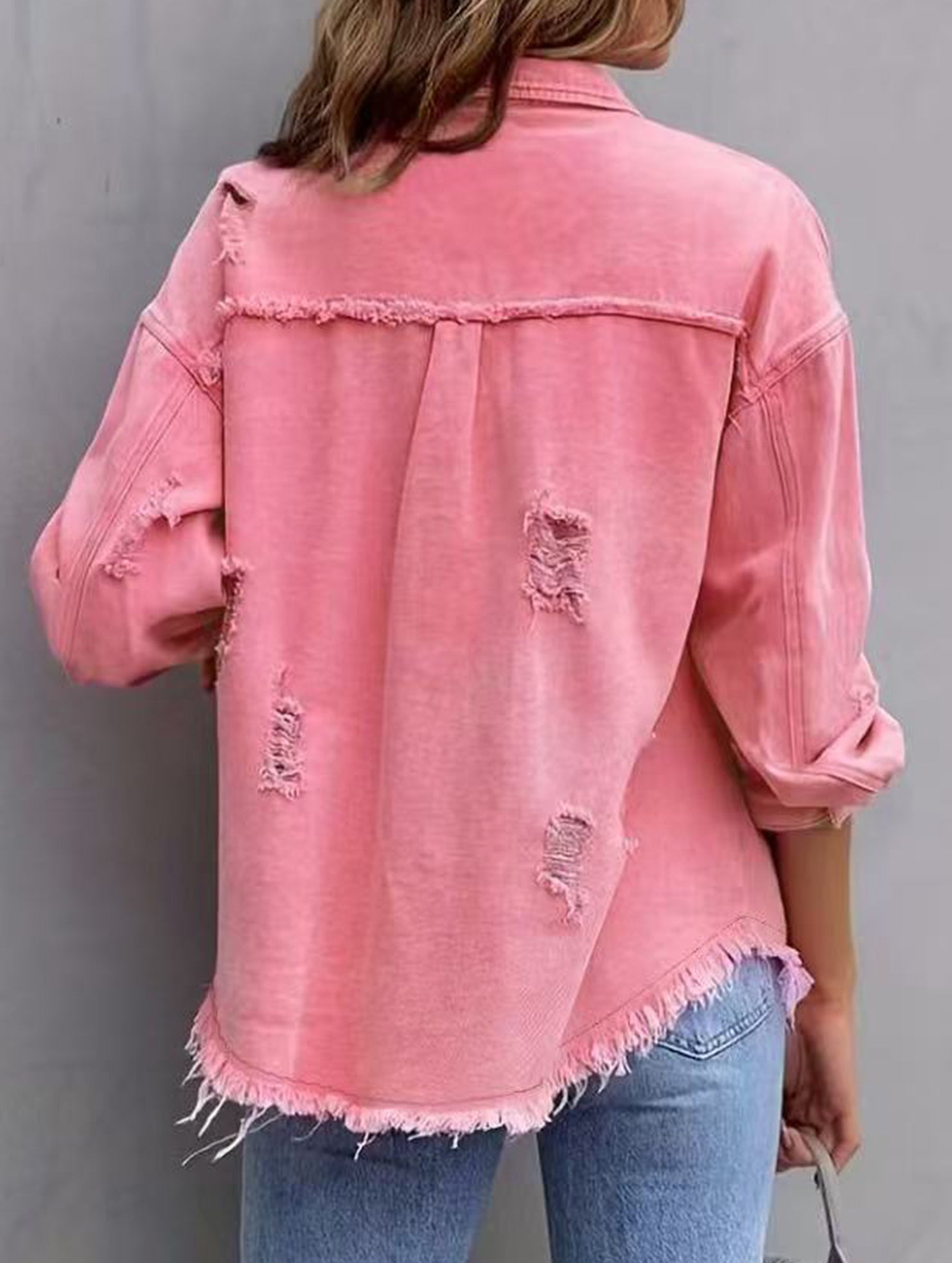 Old solid color denim coat with lapel and ripped raw edge