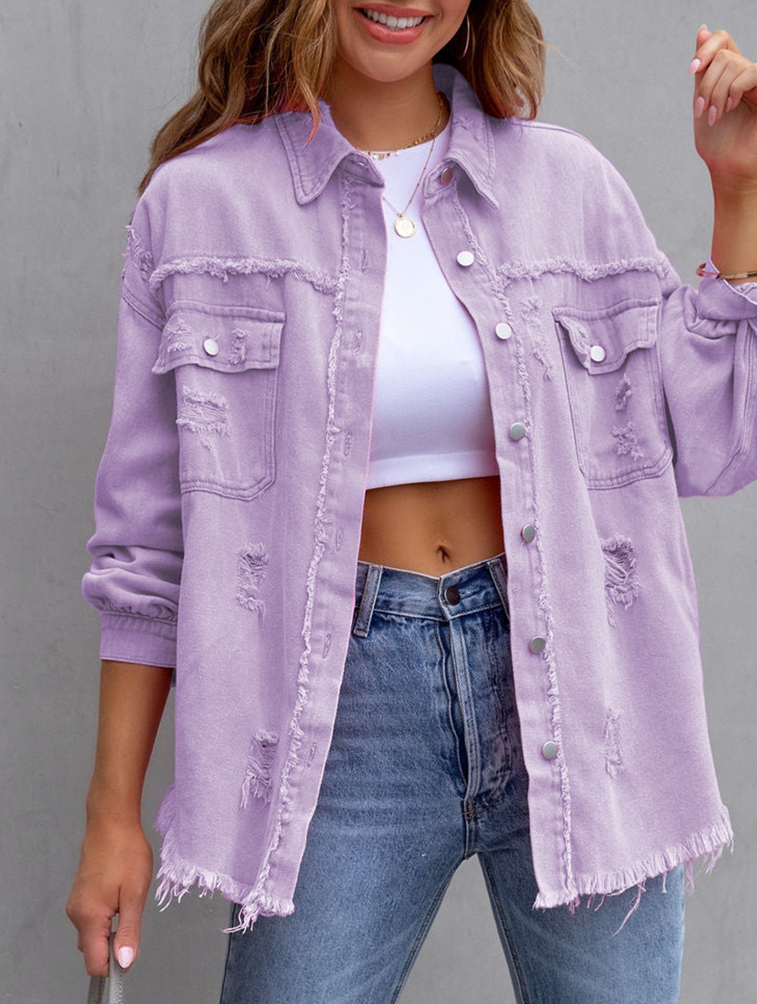 Old solid color denim coat with lapel and ripped raw edge