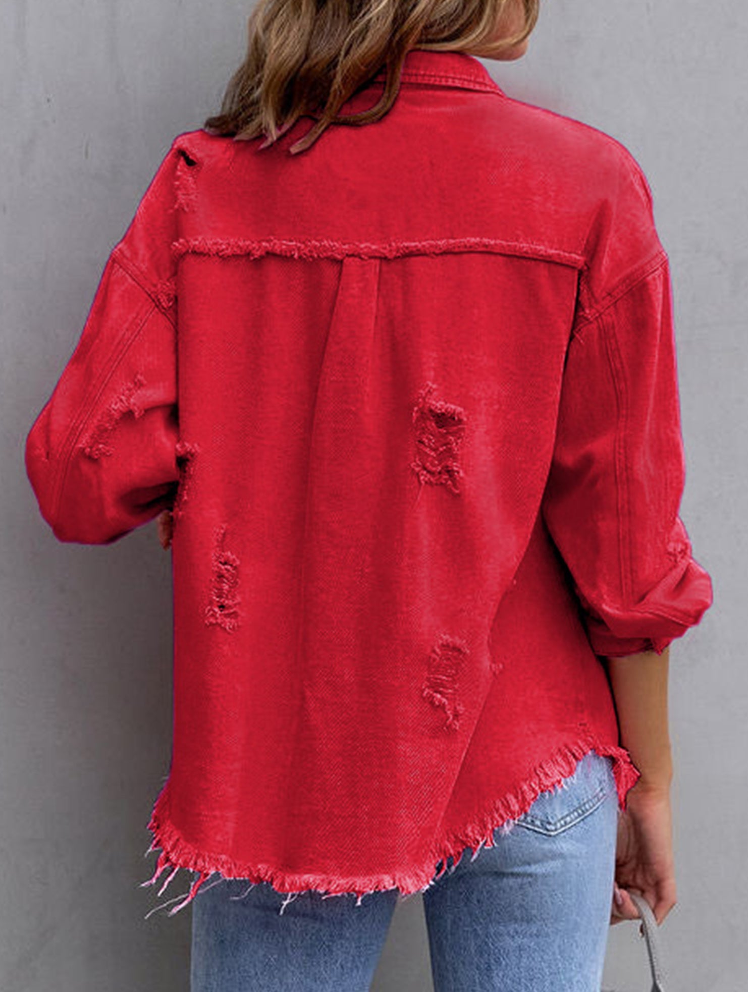 Old solid color denim coat with lapel and ripped raw edge