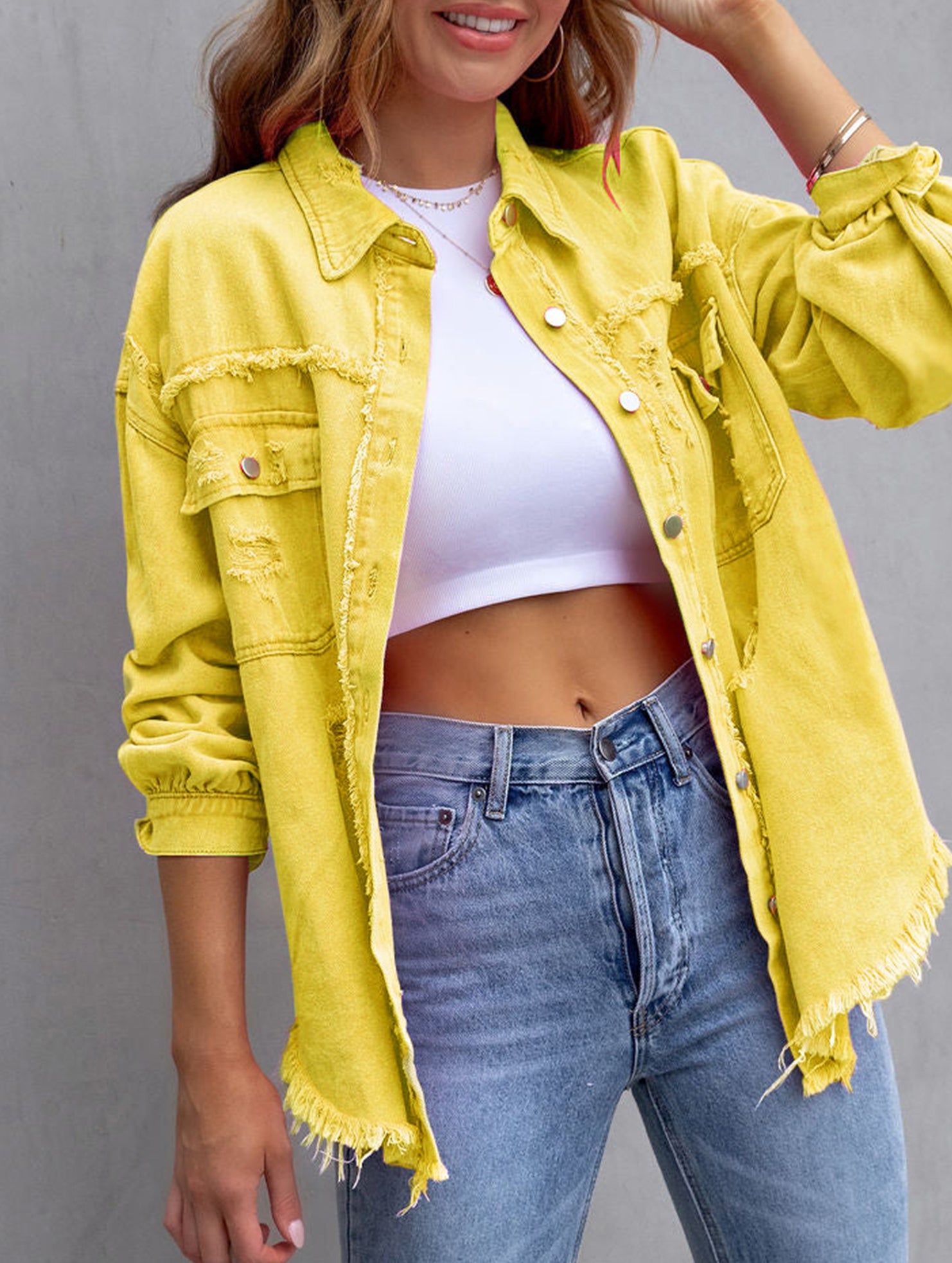 Old solid color denim coat with lapel and ripped raw edge