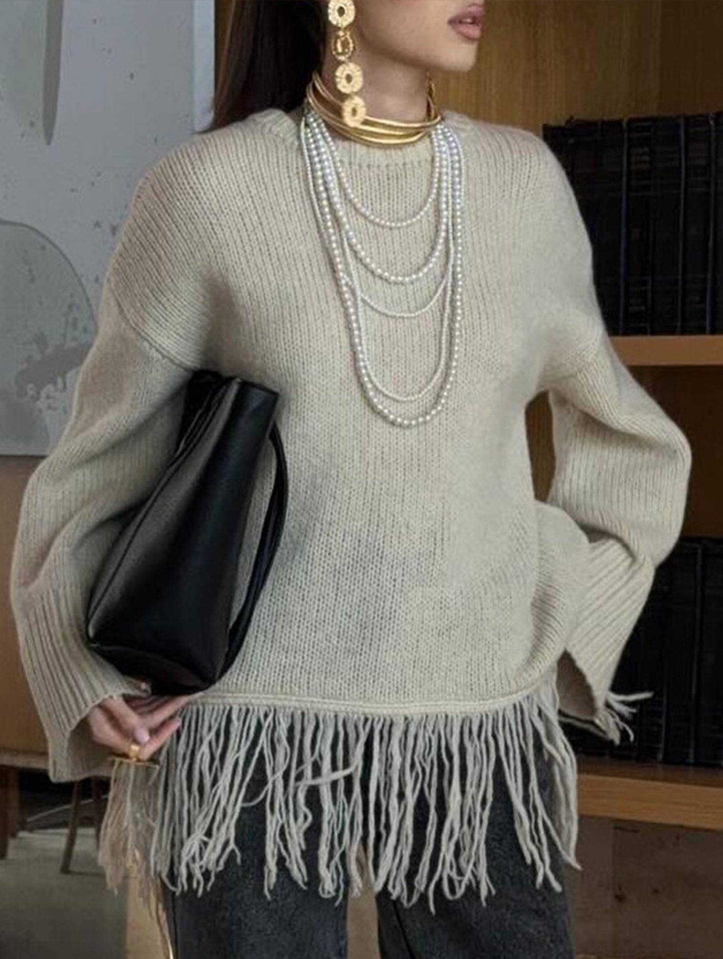 Fashionable loose tassel sweater