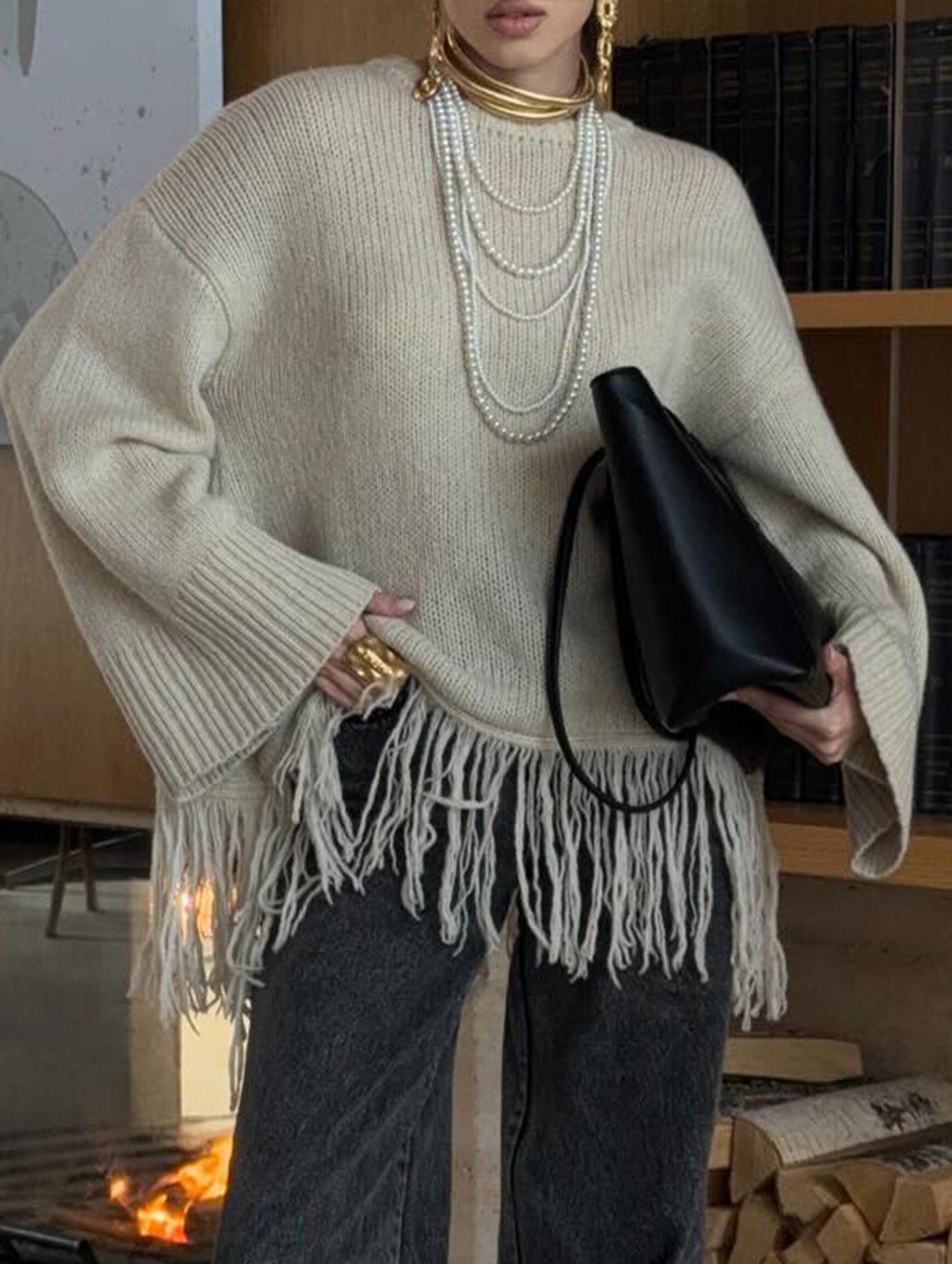 Fashionable loose tassel sweater