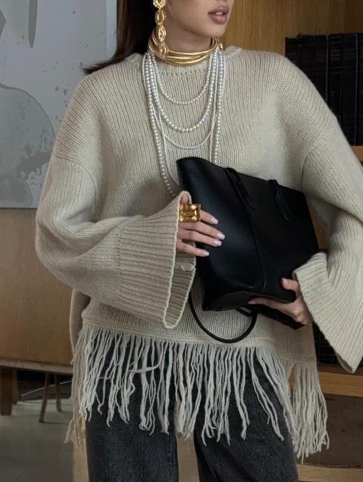 Fashionable loose tassel sweater