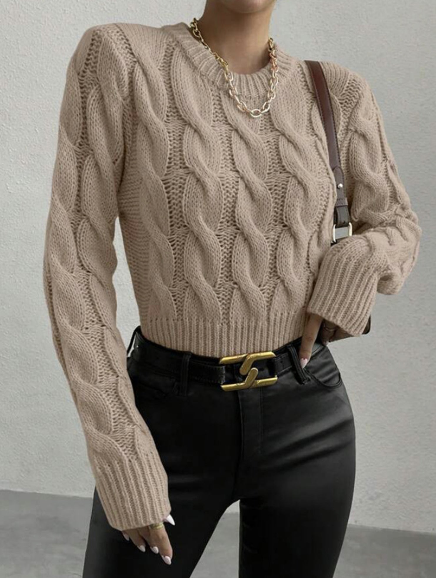 Solid color cable knit crew neck pullover sweater