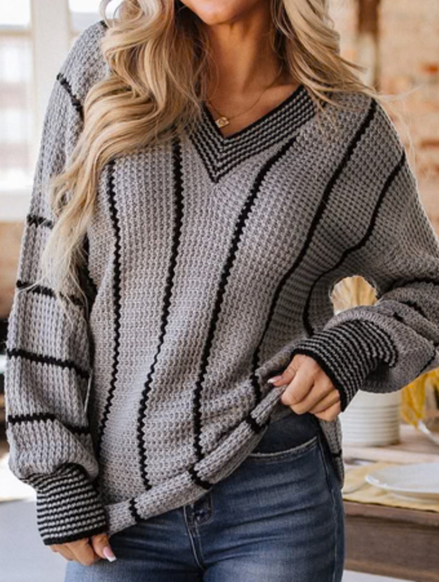 V-neck color-blocked striped pullover sweater
