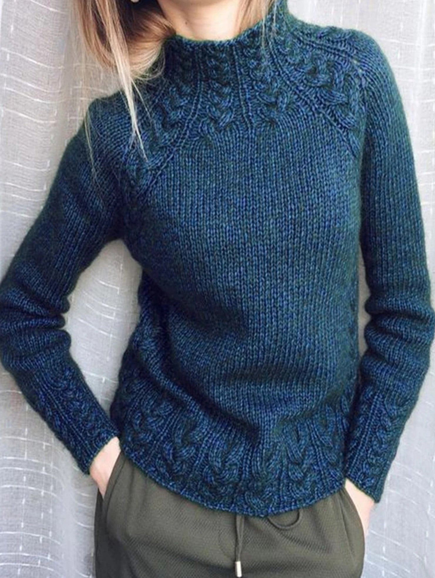 Solid color cable knit sweater