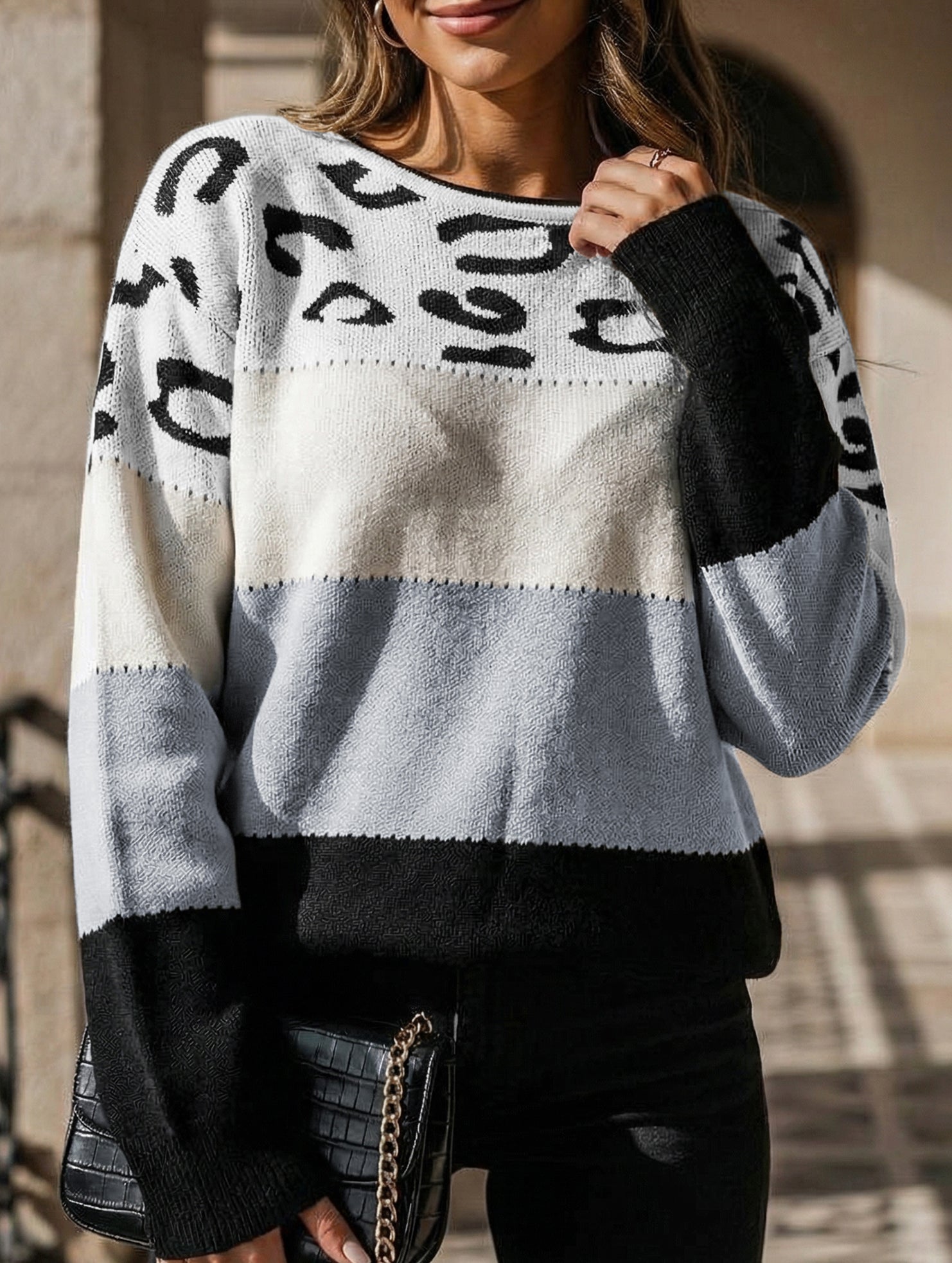 Leopard print color-blocked crew neck sweater