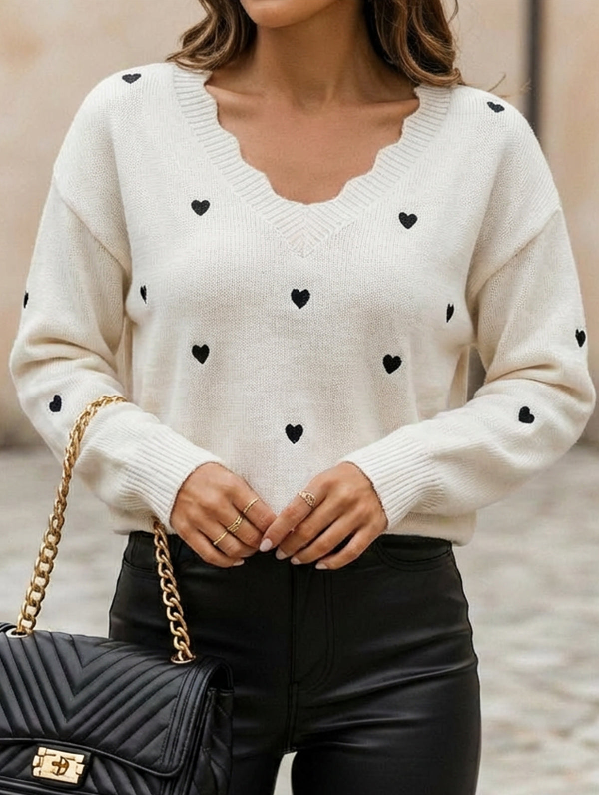 Heart-patterned jacquard V-neck ruffled knit sweater