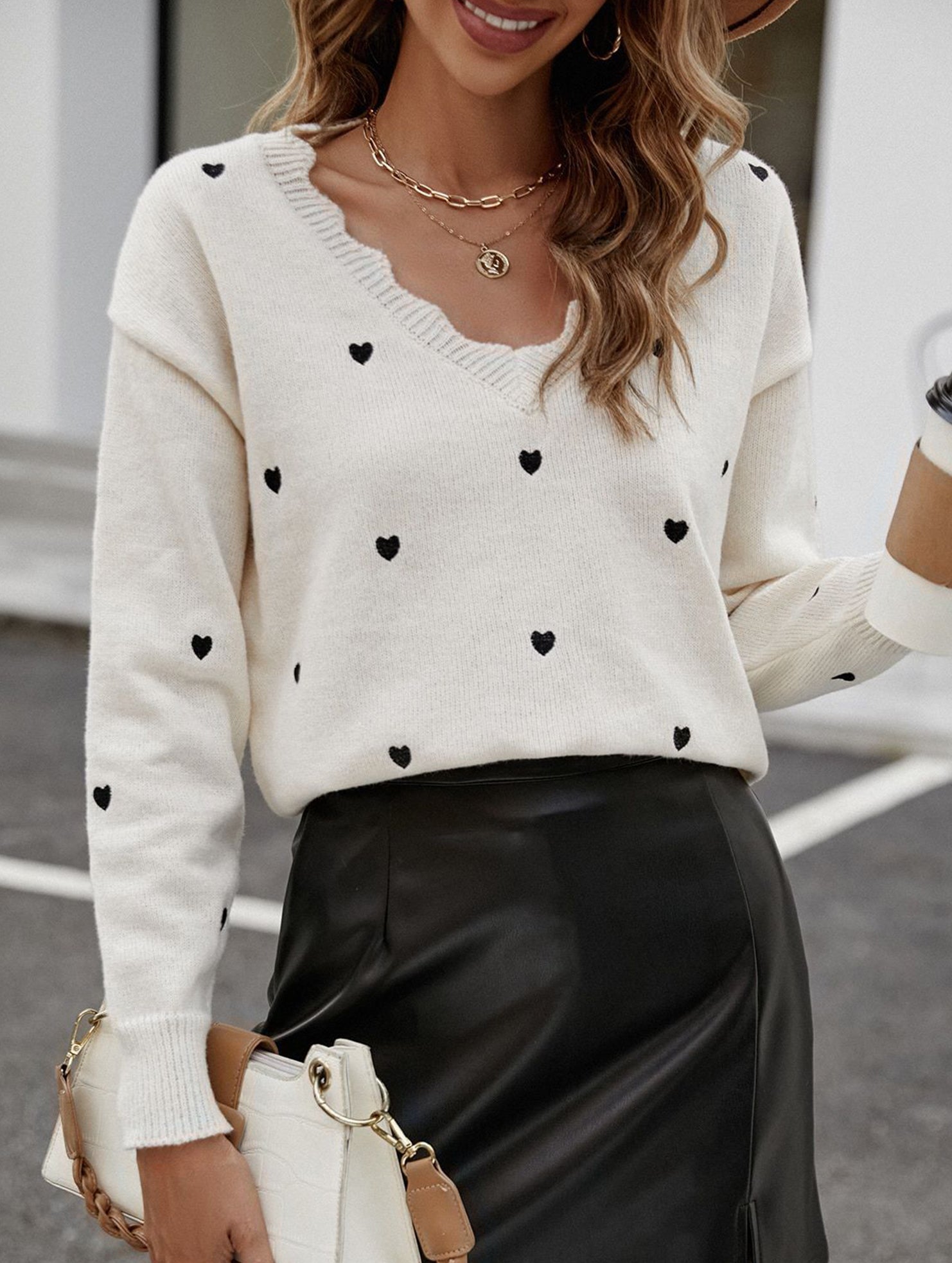 Heart-patterned jacquard V-neck ruffled knit sweater