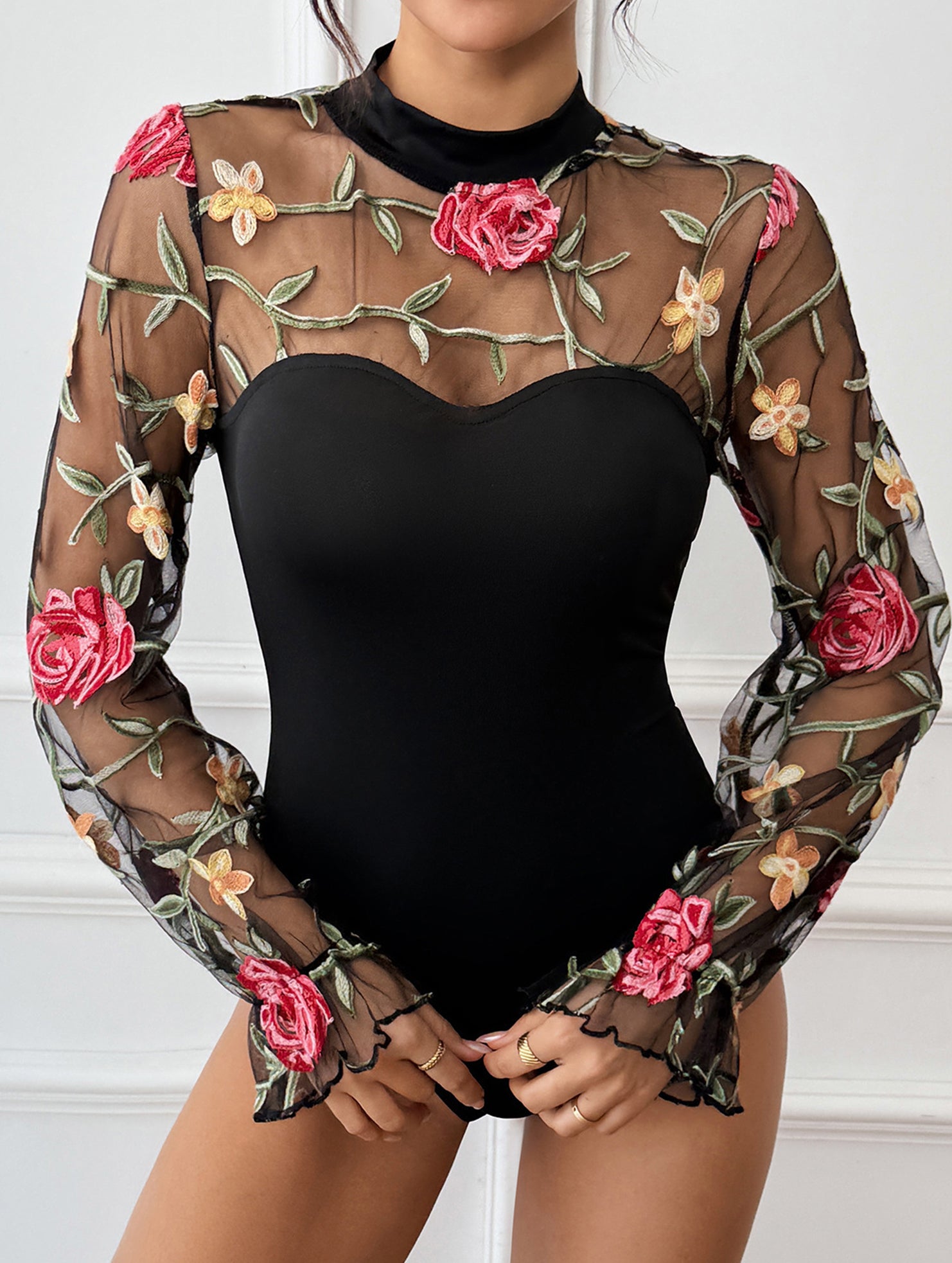 Lace-trimmed see-through high-neck bodysuit