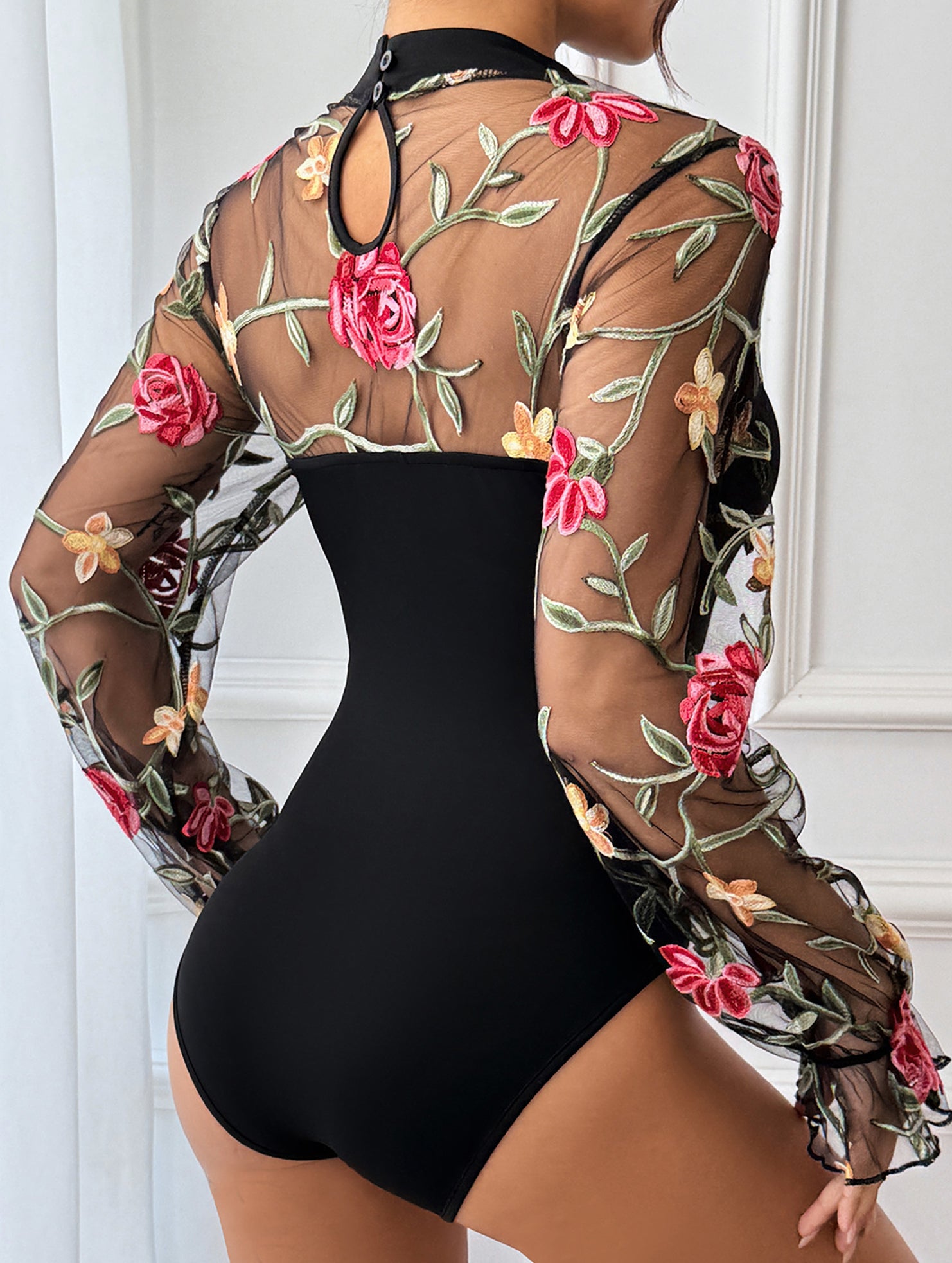 Lace-trimmed see-through high-neck bodysuit