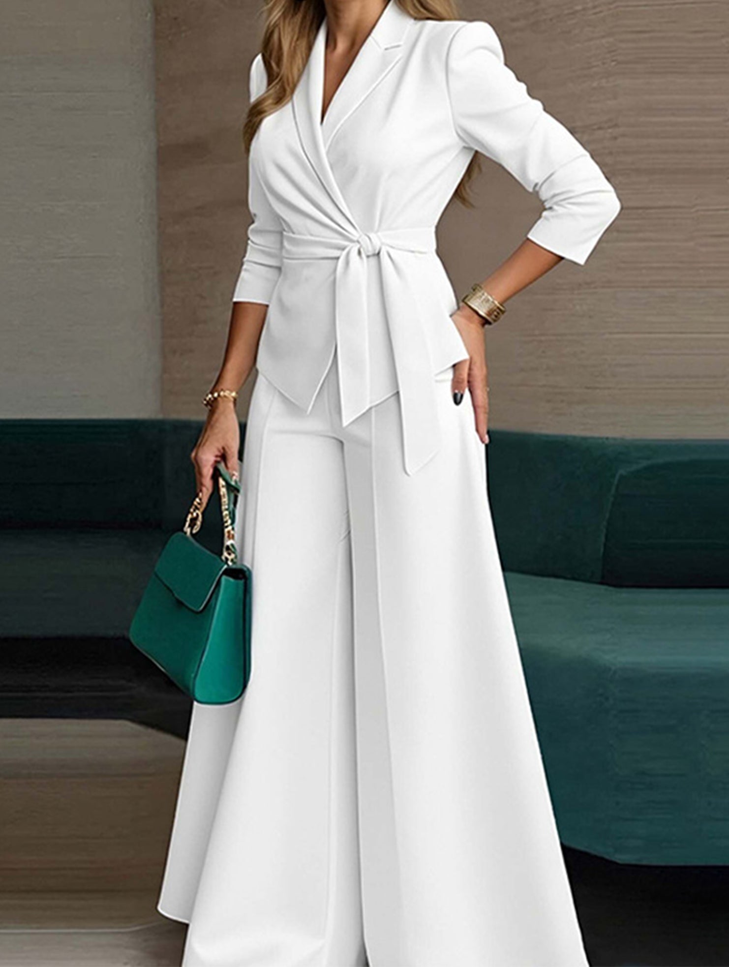 Fashionable belted jacket and trouser suit for women