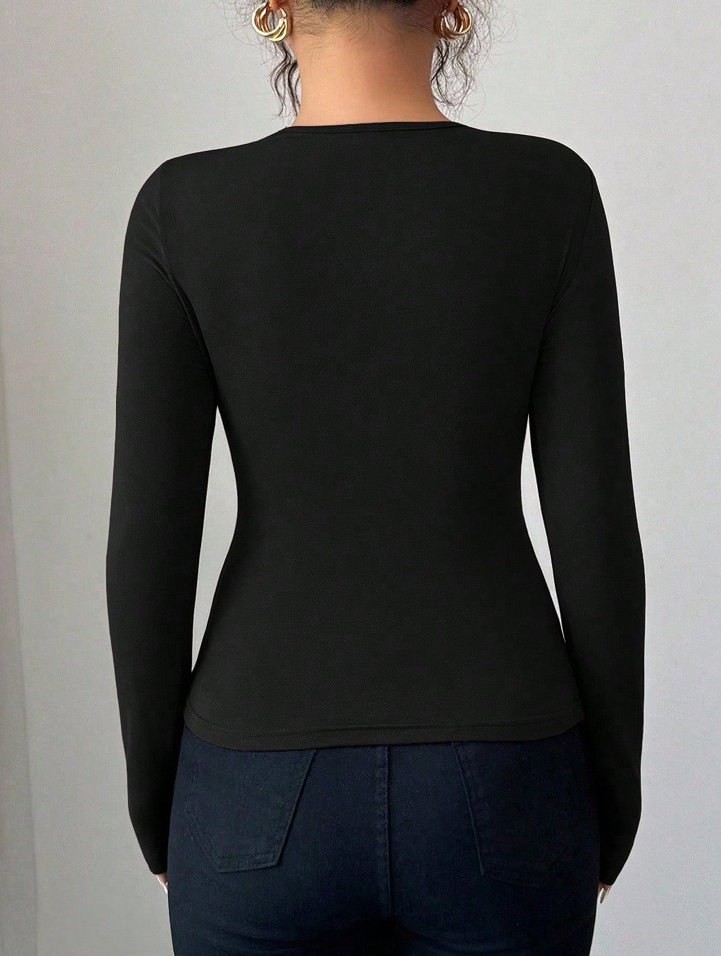Asymmetric cutout slim-fit top