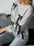 Grey bow-decorated crew neck sweatshirt