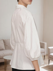 Irregular design three-quarter sleeve lapel top